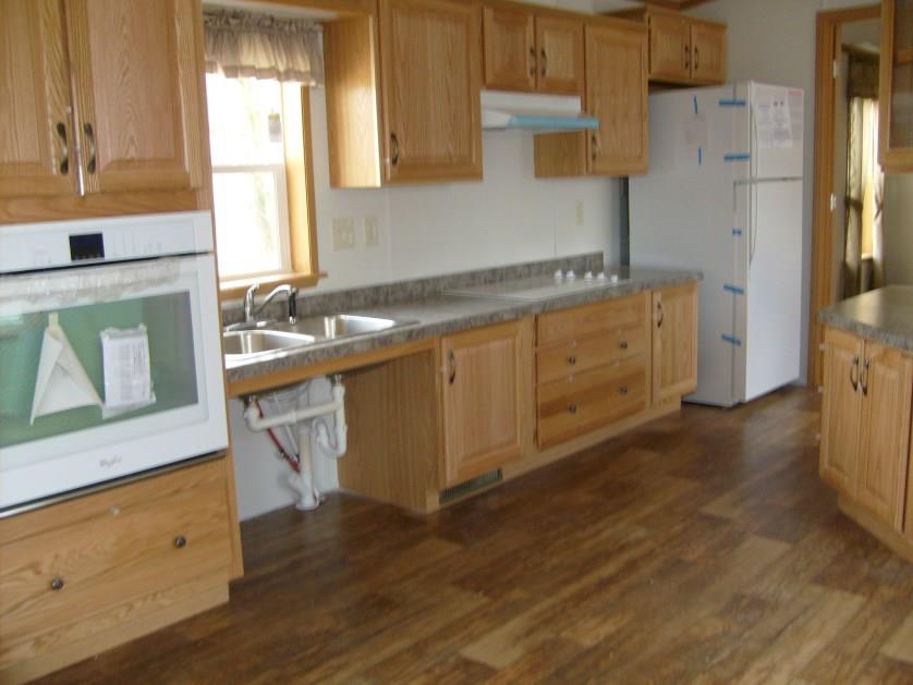 Roll under kitchen sink & lowered wall oven