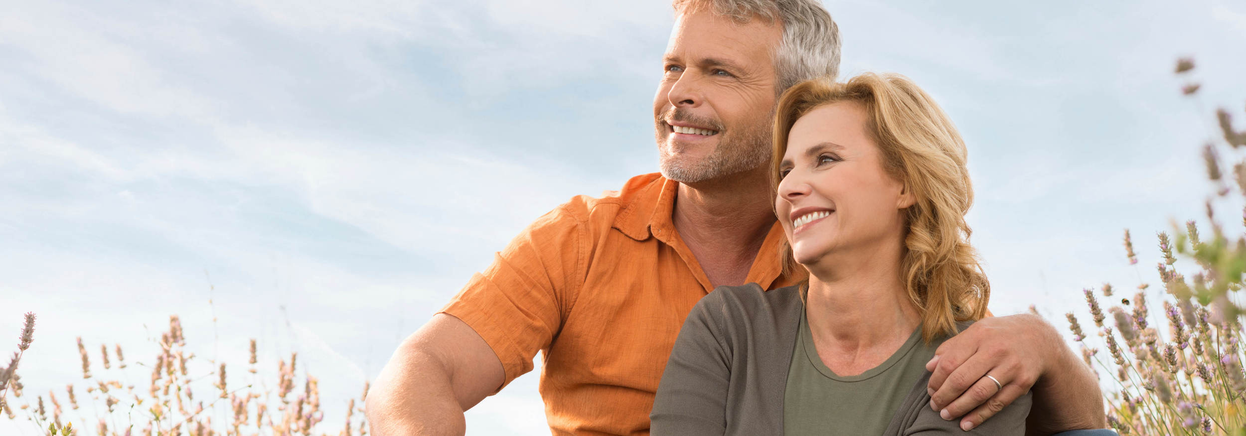 Couple Smiling with Tooth Replacement options at Michael Kapner, DDS