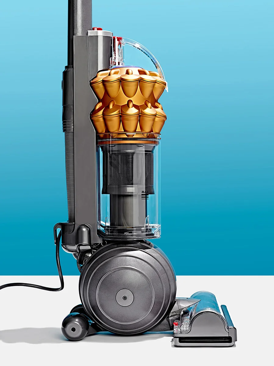 great modern product photo of Dyson Ball Vacuum Cleaner on Bright studio background