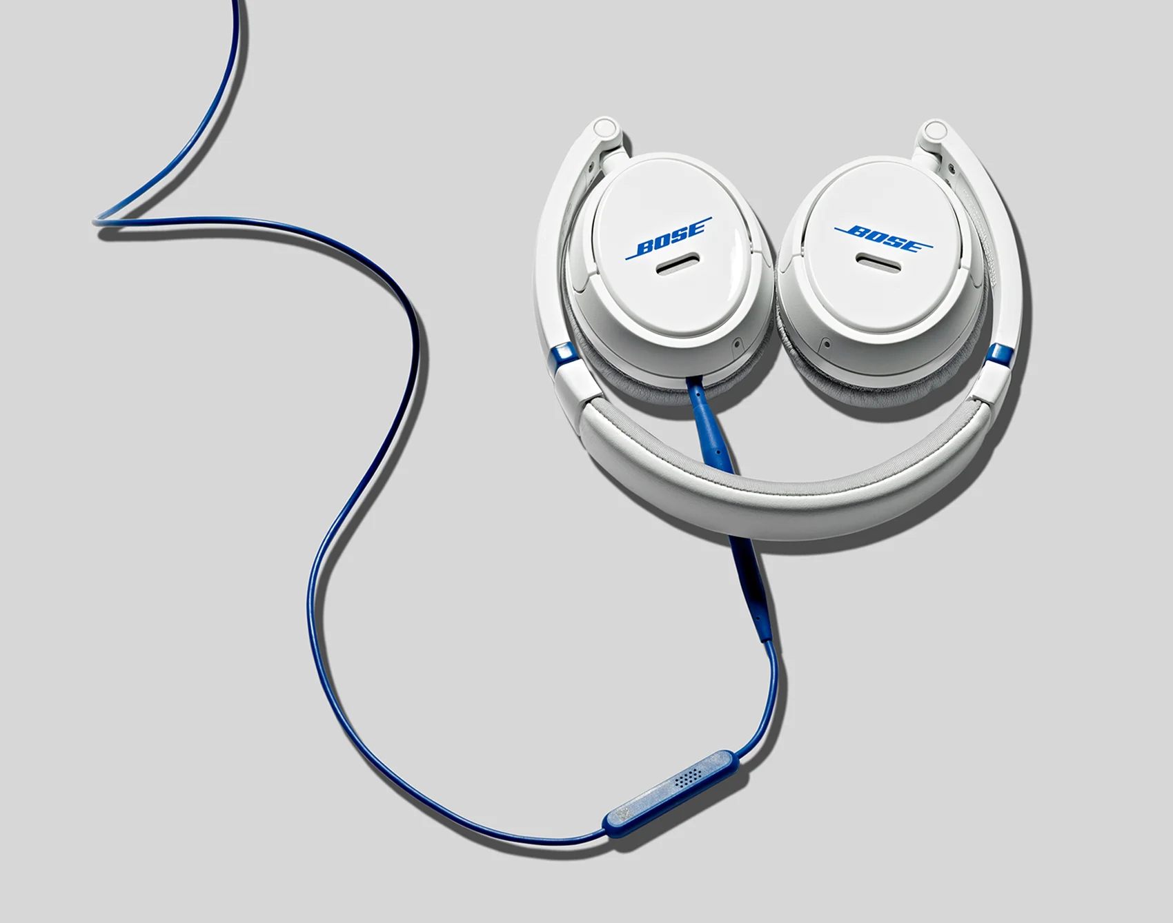 elegant tech still life of Bose headphones on grey background