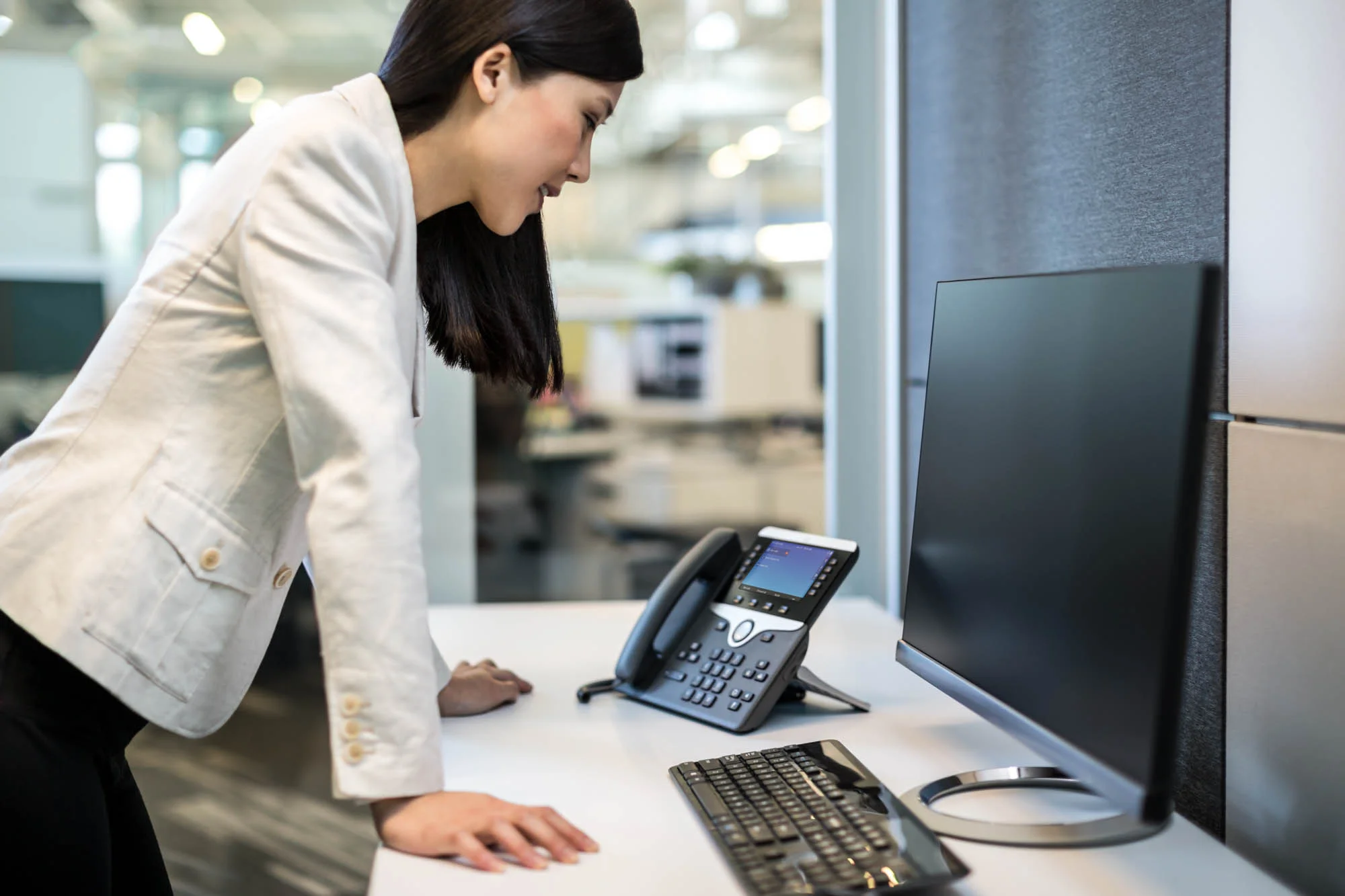 Woman-standing-near-desk-Jordan-Reeder.jpg