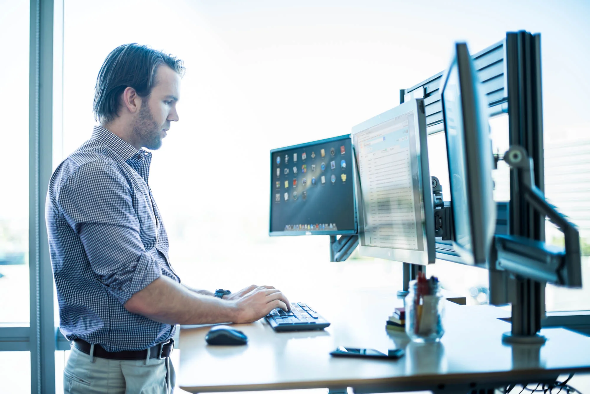 Man-working-on-monitors-Jordan-Reeder.jpg