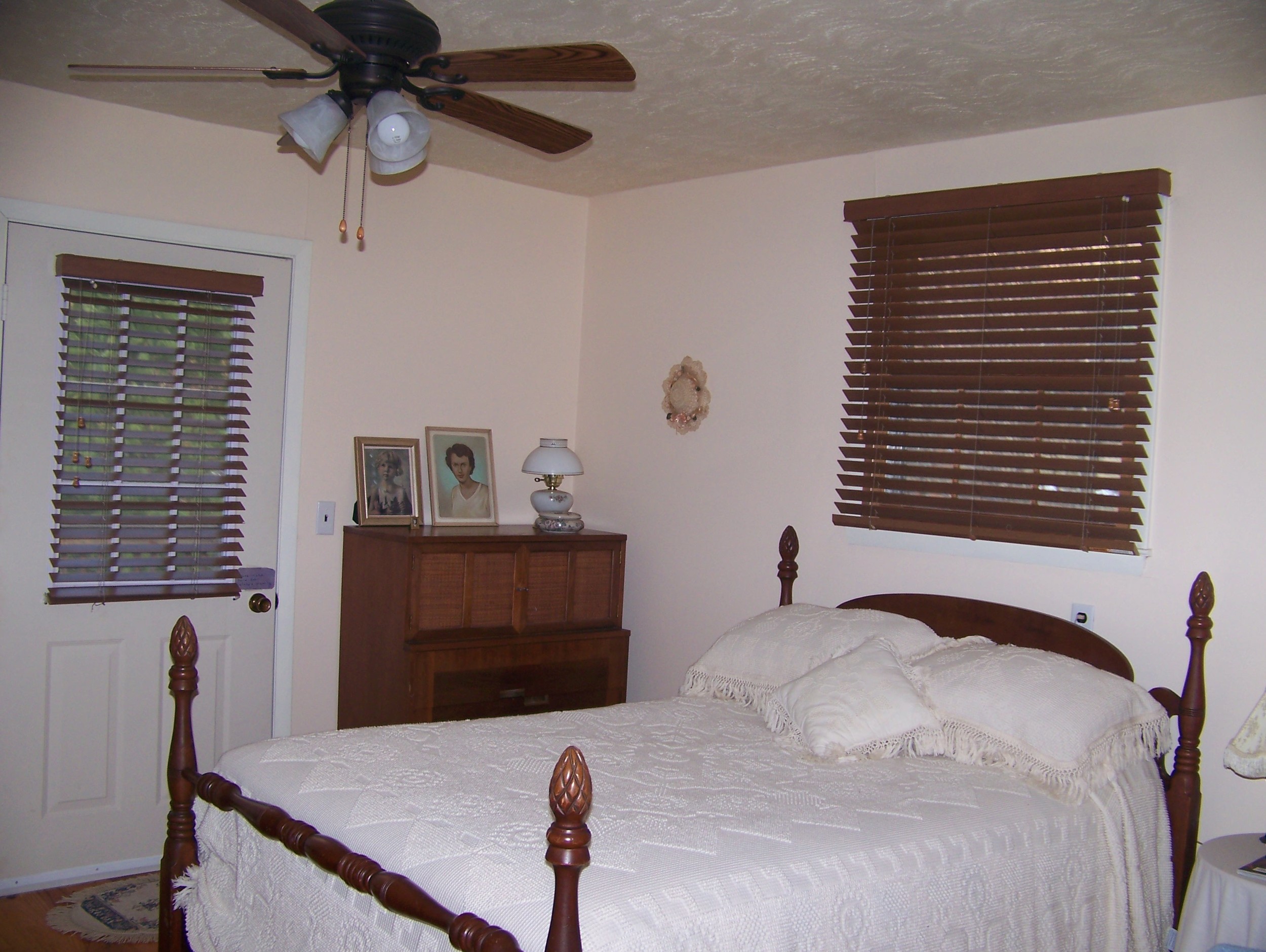  The master bedroom features a queen-sized bed. 