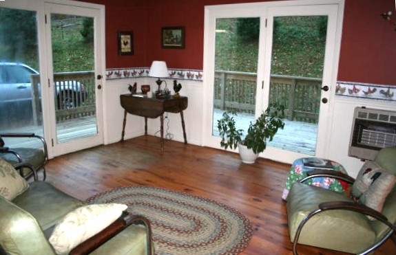  The sunroom -- the peacocks love to hang out on the porch and preen in their reflection in the doors.&nbsp; 