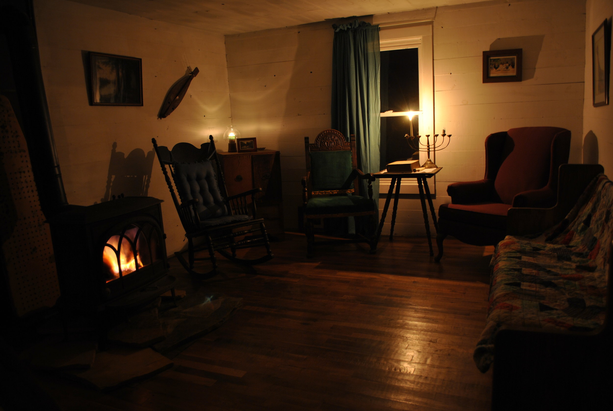 Living Room at night with woodstove