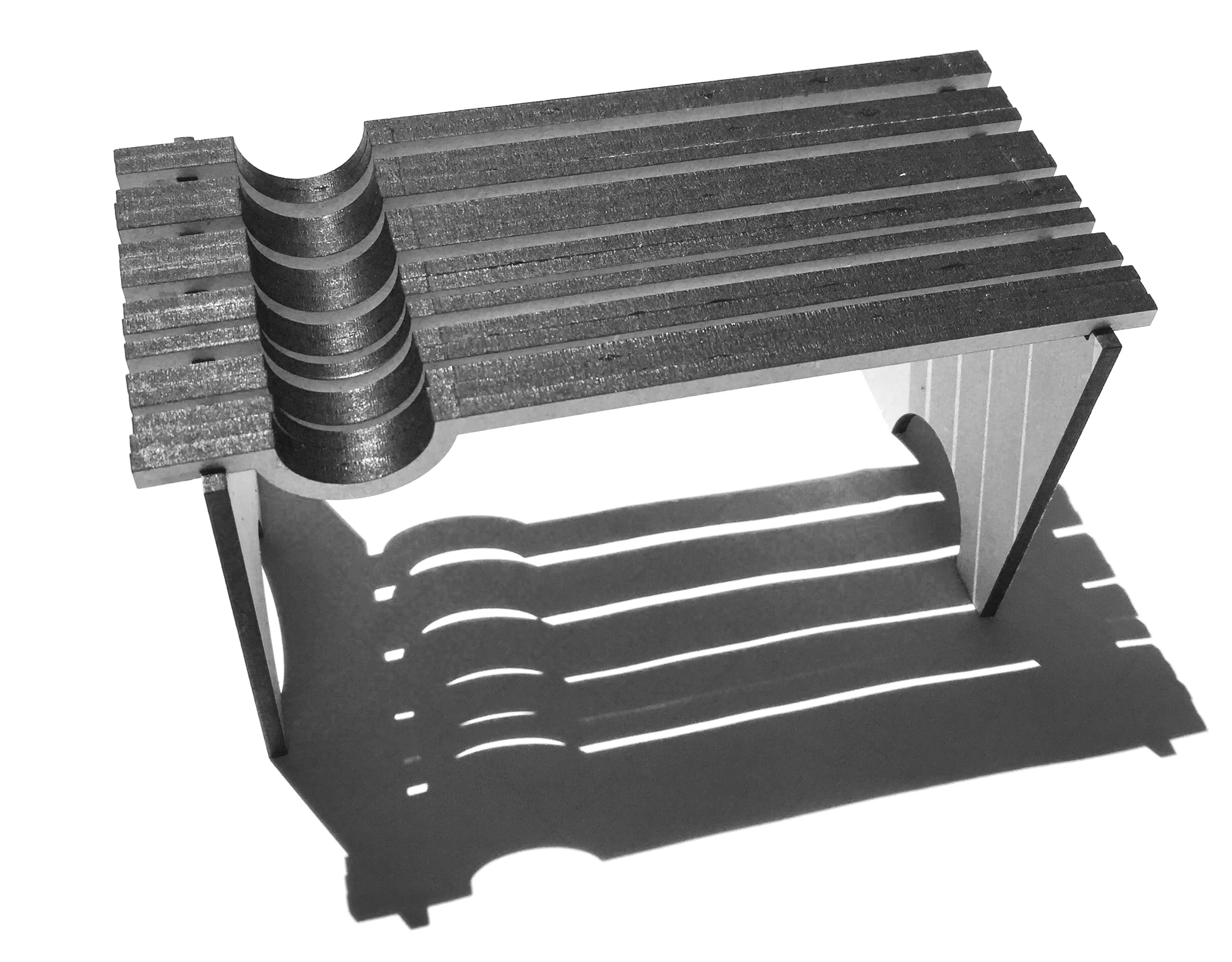 Alexa's bench design for the upcoming furniture show at the Boulder Public Library. A handmade leather bolster will fit into the curve on the left side of the bench.