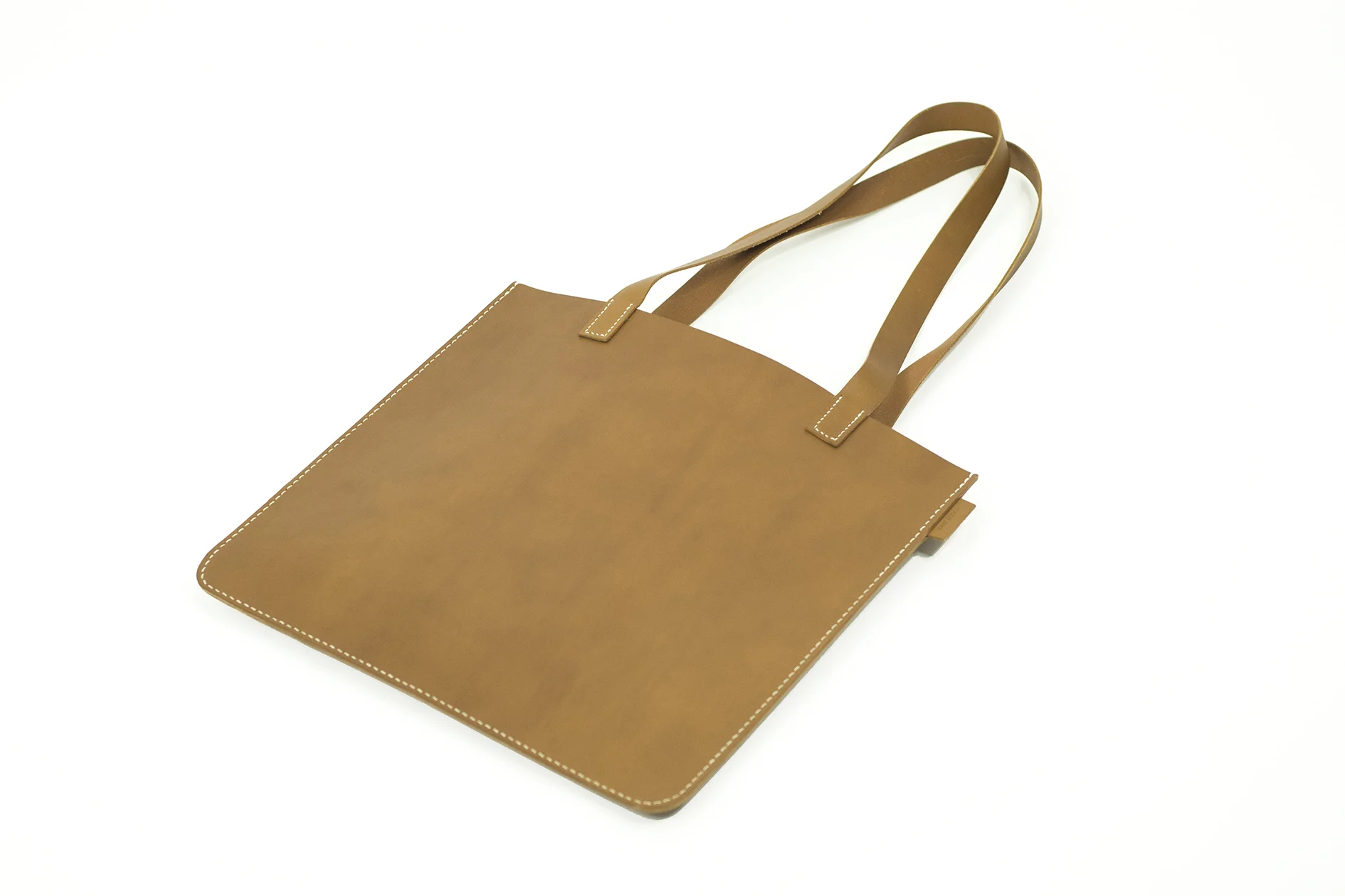Leather bag and accessory brand focused on telling stories through minimal and timeless design - handmade in East London