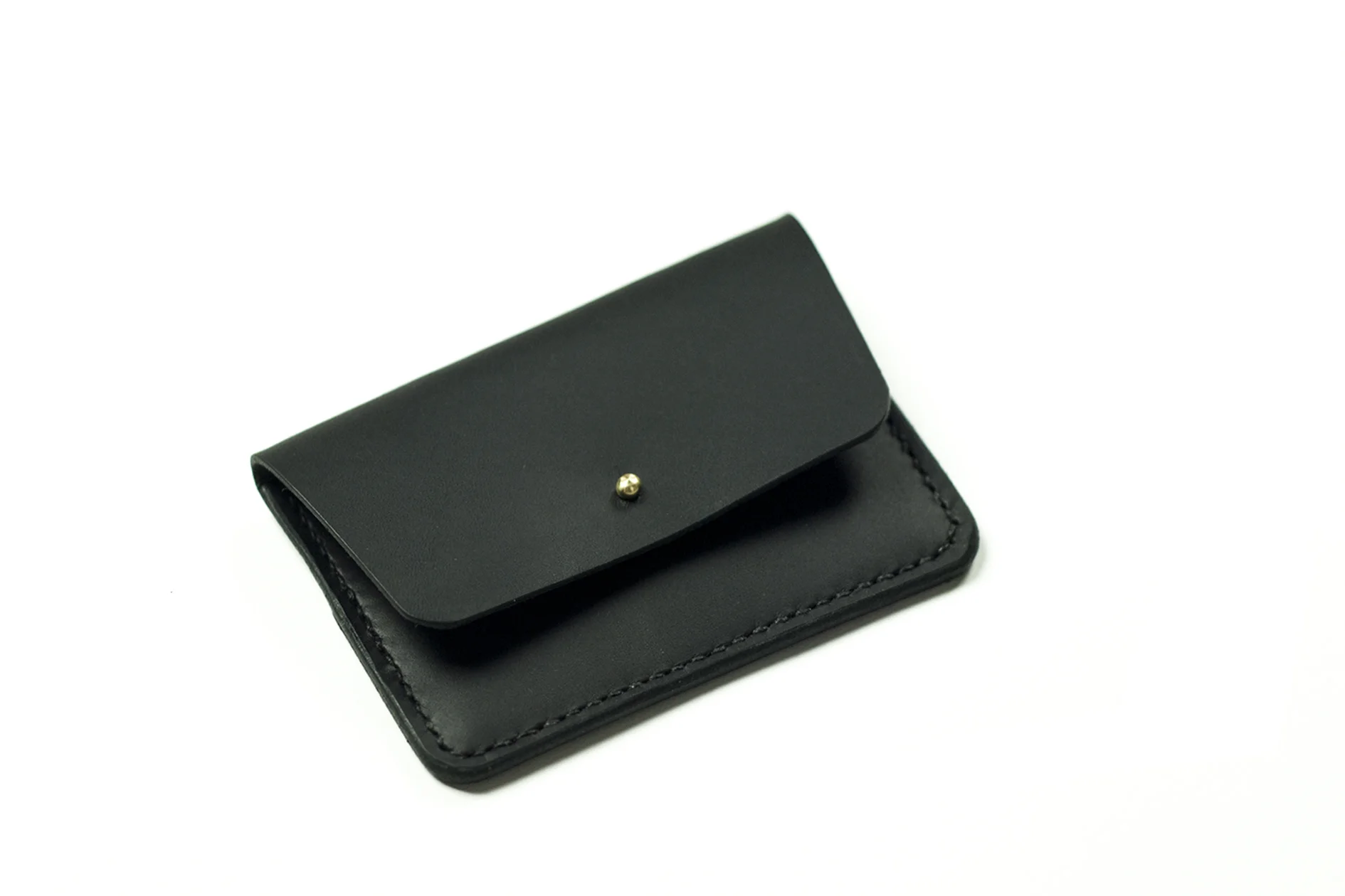 Leather bag and accessory brand focused on telling stories through minimal and timeless design - handmade in East London