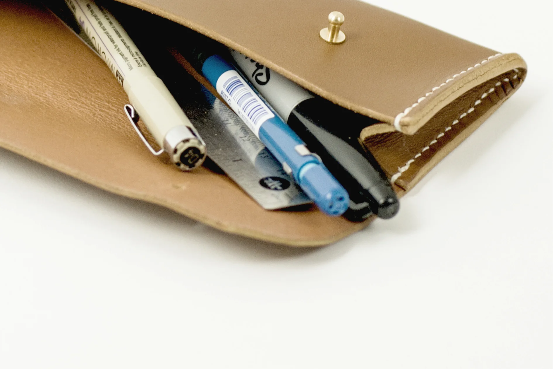 Leather bag and accessory brand focused on telling stories through minimal and timeless design - handmade in East London