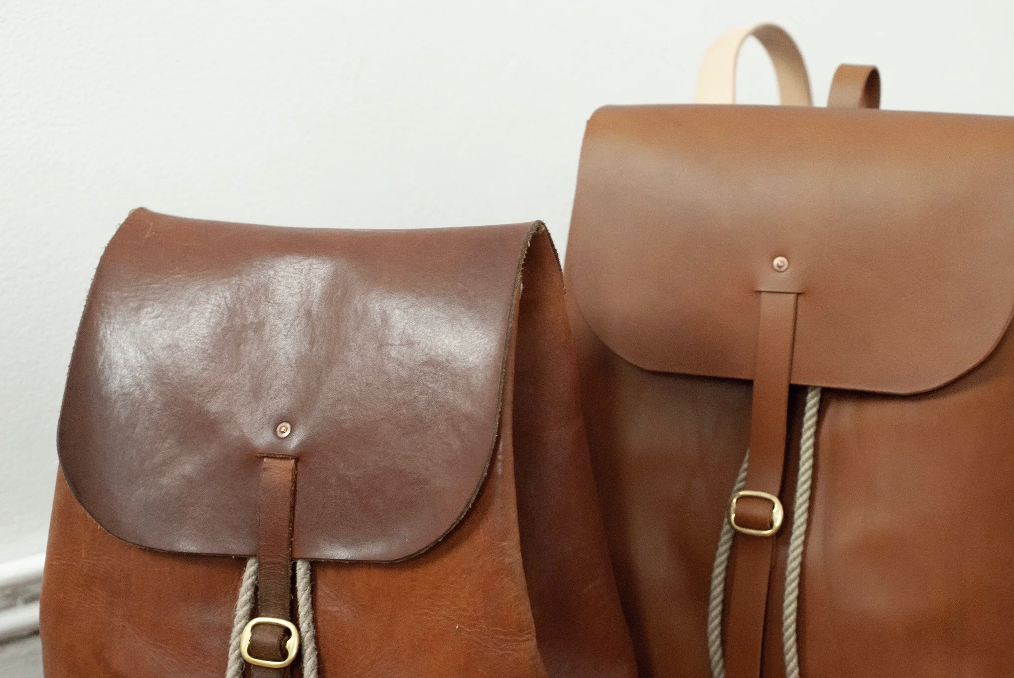 Close up of my Everyday Rucksack (4 years in the game) and a new Everyday Rucksack - both in Caramel