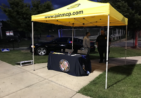 MCPD tent at Friday Night Lights Event