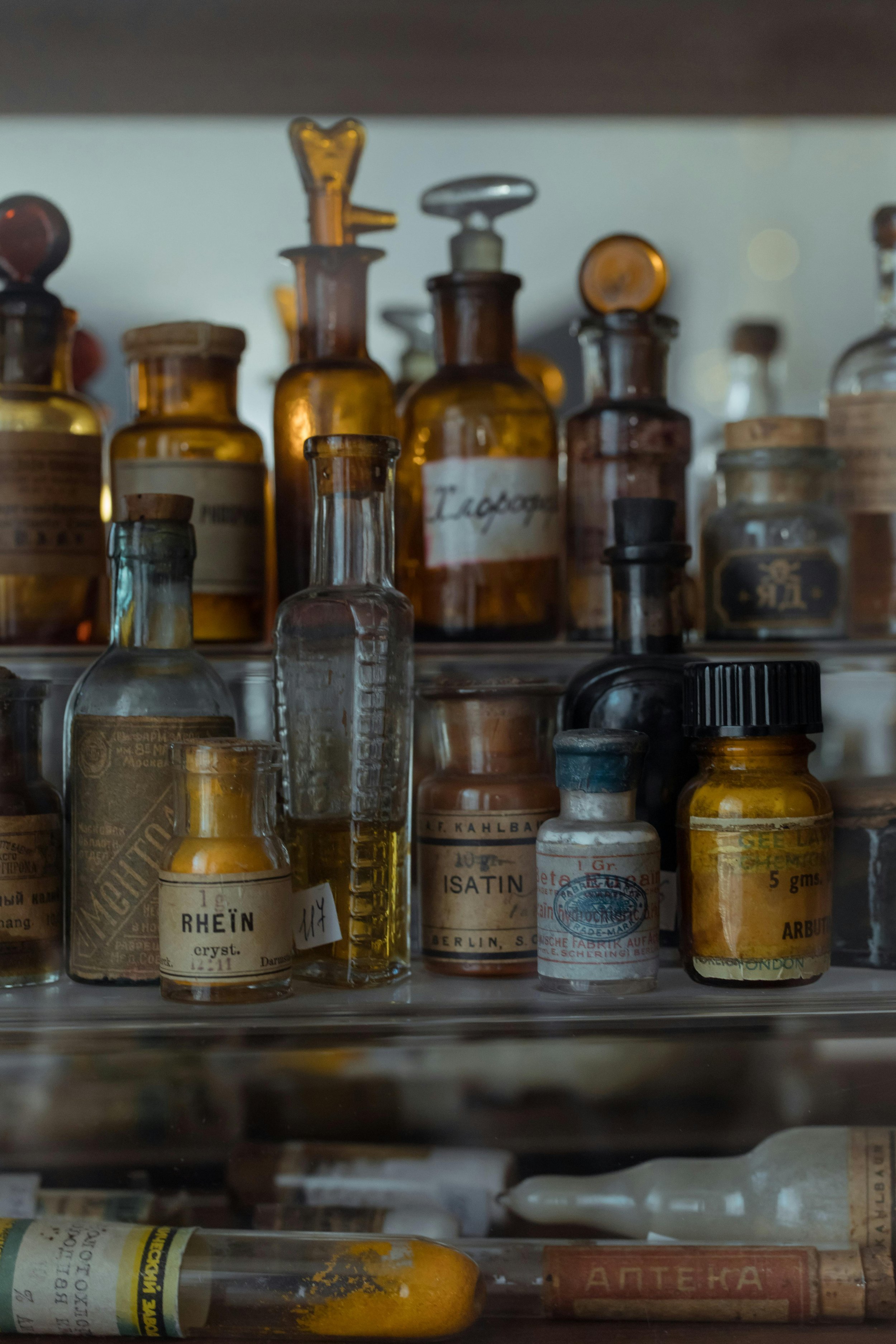 Vintage medicine bottles from early 1900s representing unregulated consumer products