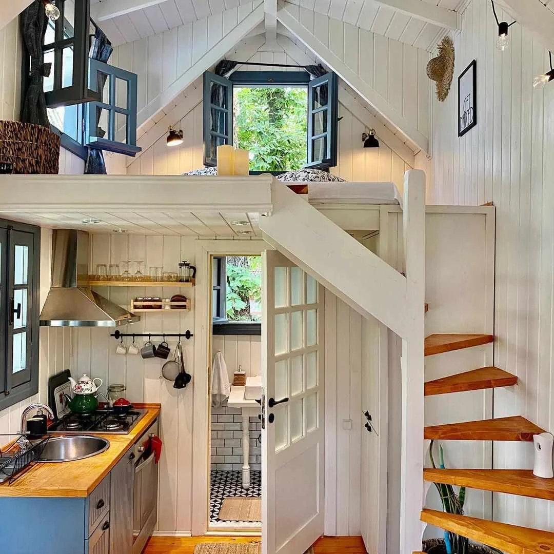  This example has a smaller sink, but they have a full oven and stove top built into the cabinet, along with a vent hood.  
