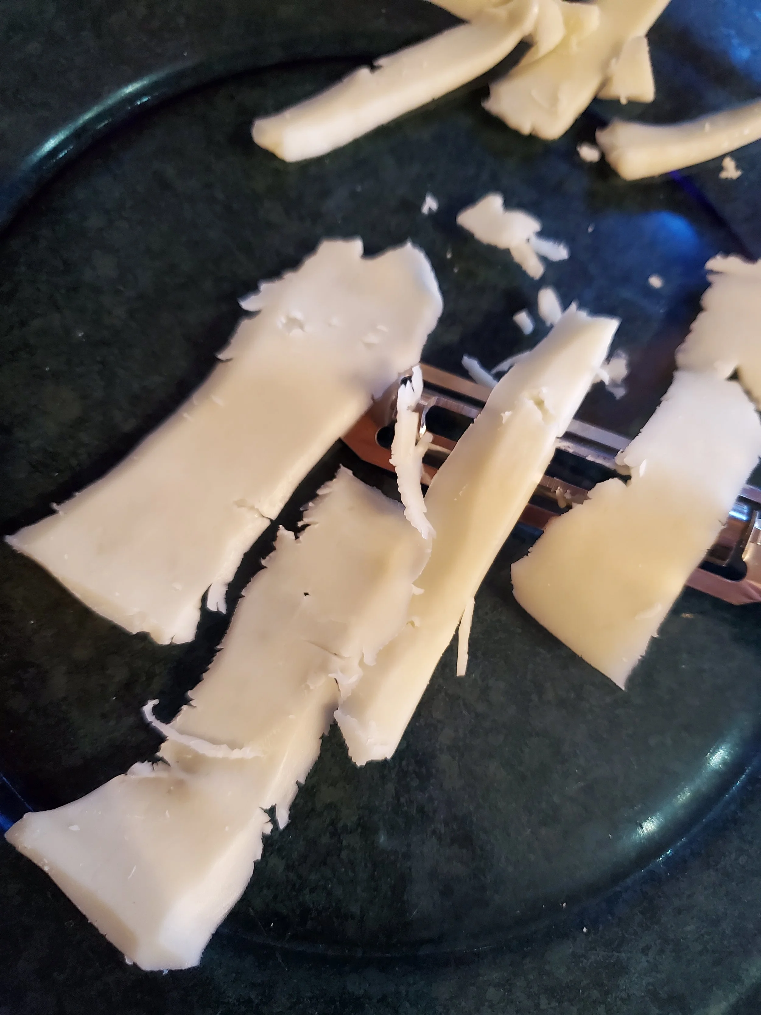  Feathery, jagged cheese bandages.  