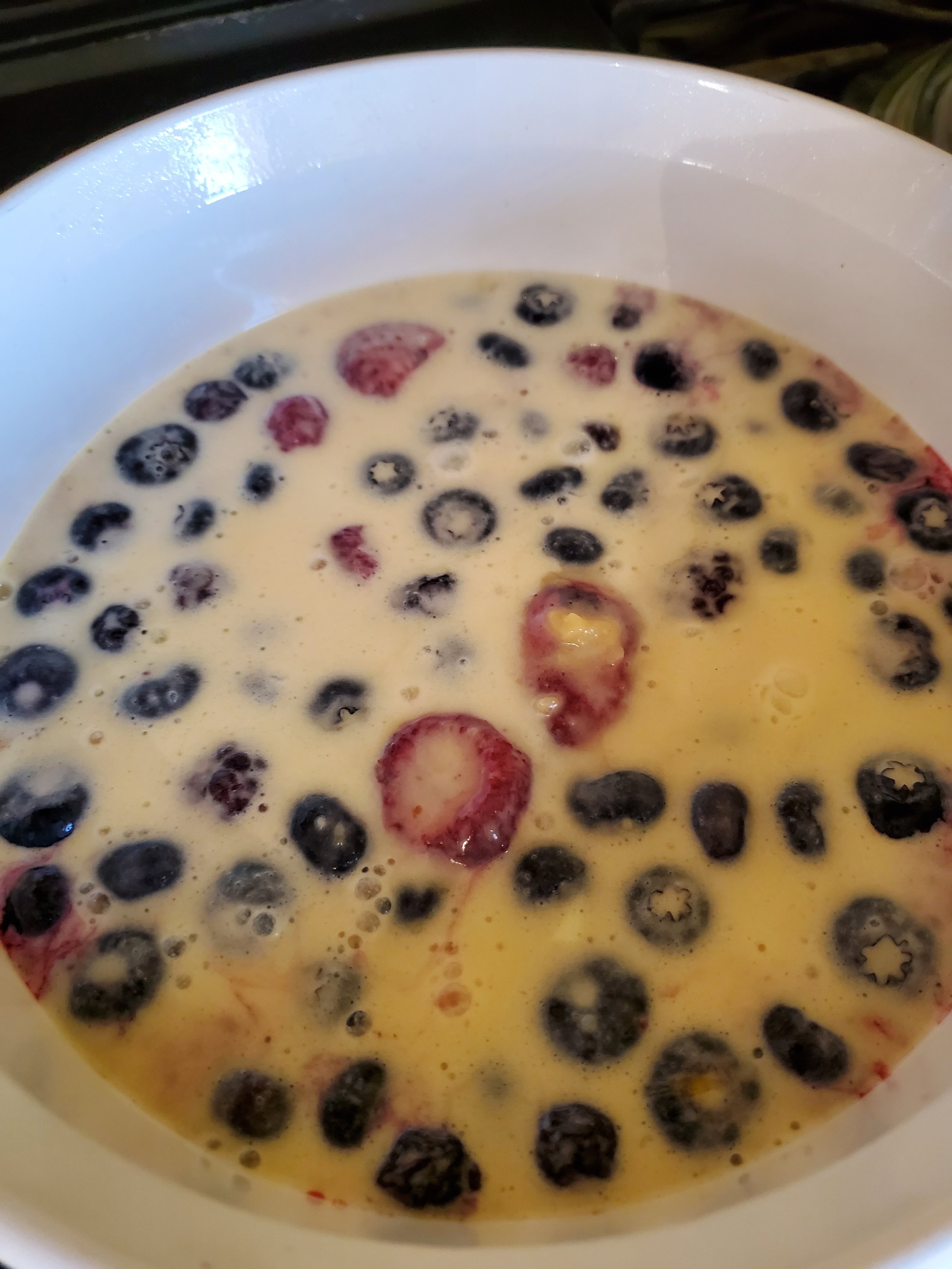 Let's add our berries to the batter...