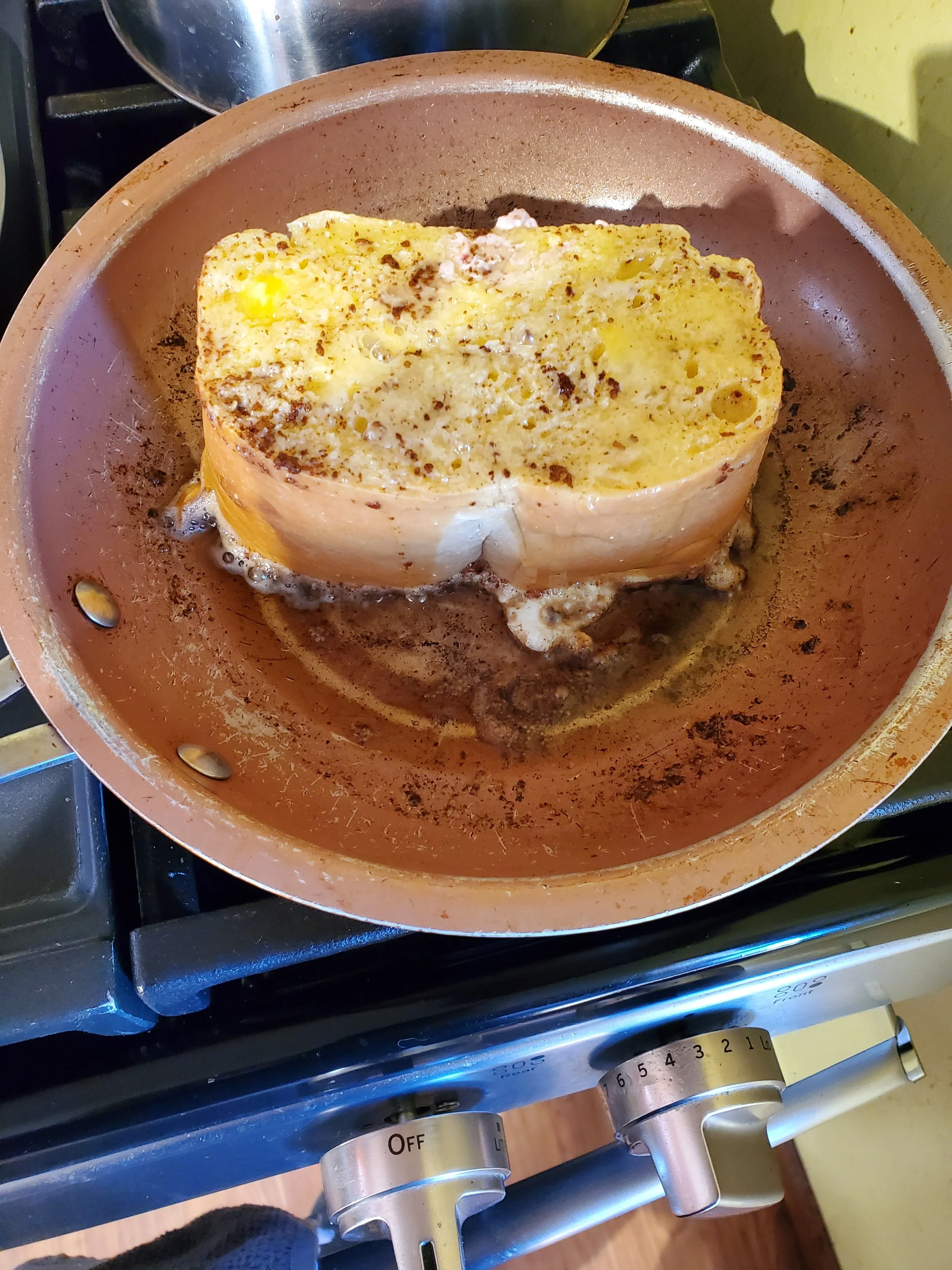  And we begin the cooking process! At this point it smells so sweet and eggy, but that shifts as the egg cooks and the surface of the toast browns.  