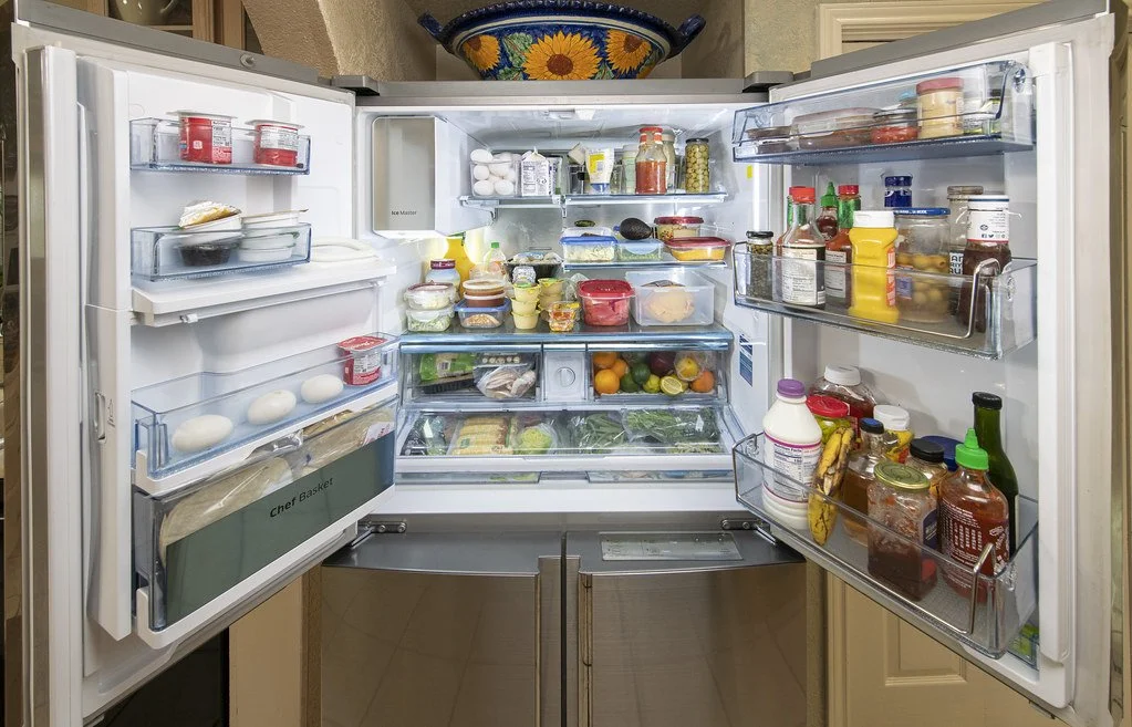  A refrigerator with some things stored properly and some not. How many can you find?   Courtesy of the USDA  
