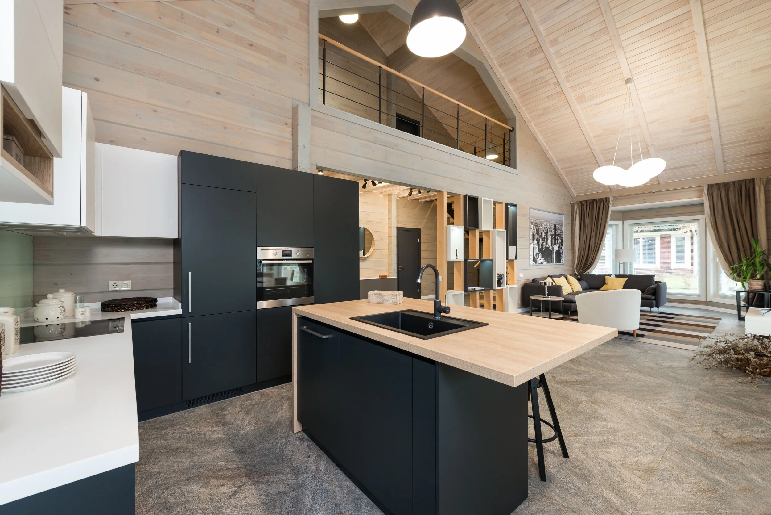 Spacious open-concept home highlighting flooring and ceiling design