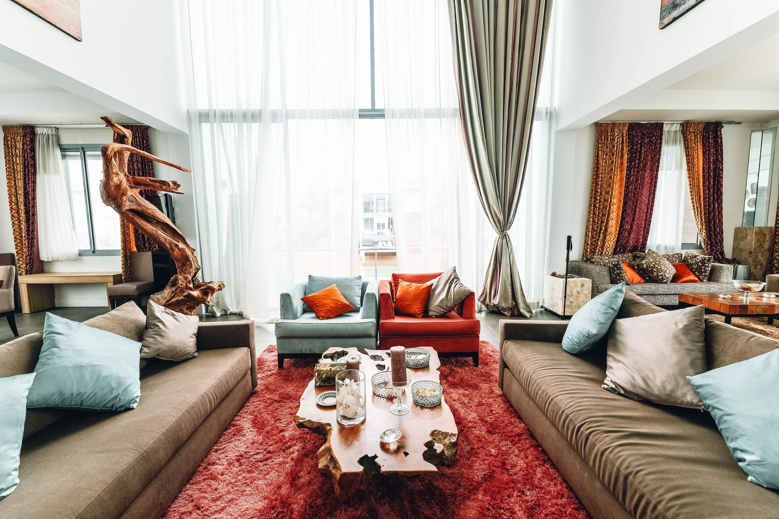 Elegant modern living room with warm neutral colors and timeless decor replacing outdated trends.