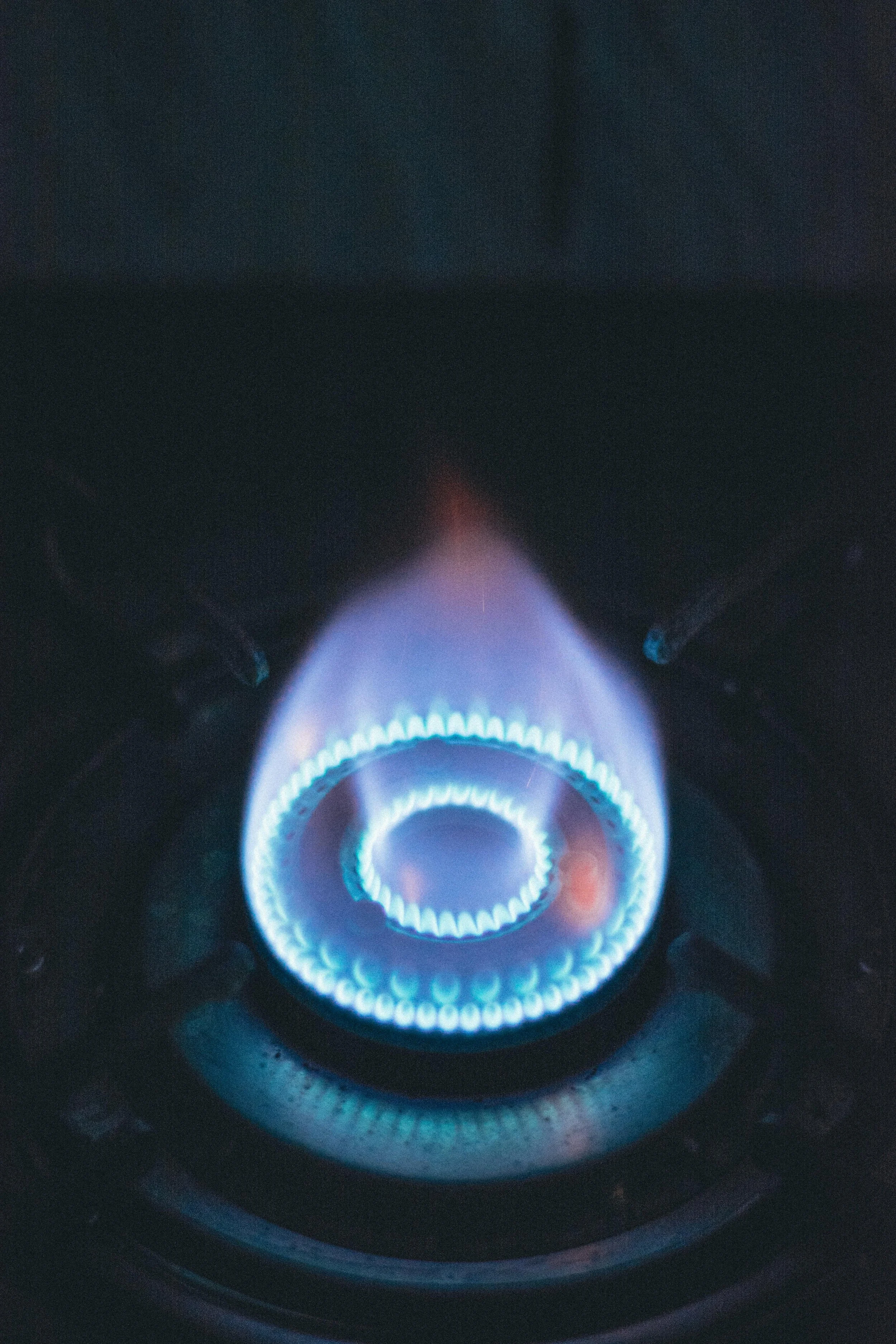Stainless steel gas range in a modern luxury kitchen