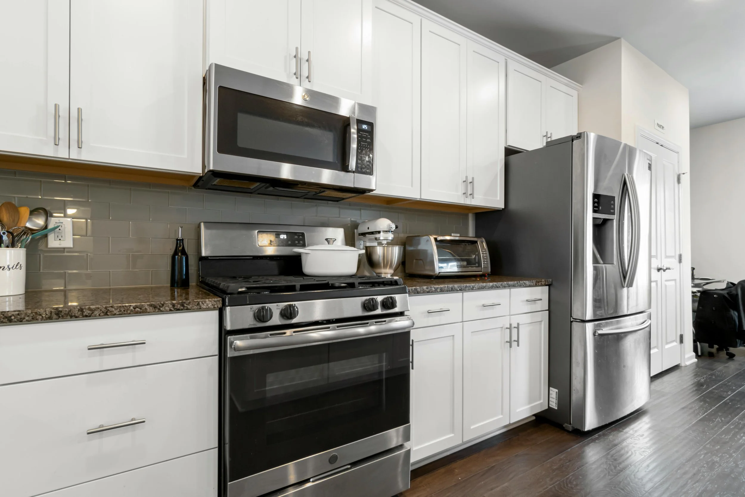 Modern kitchen featuring stainless steel appliances commonly found in today’s homes.