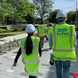 Composition team walking to Te Pae Christchurch Convention Centre