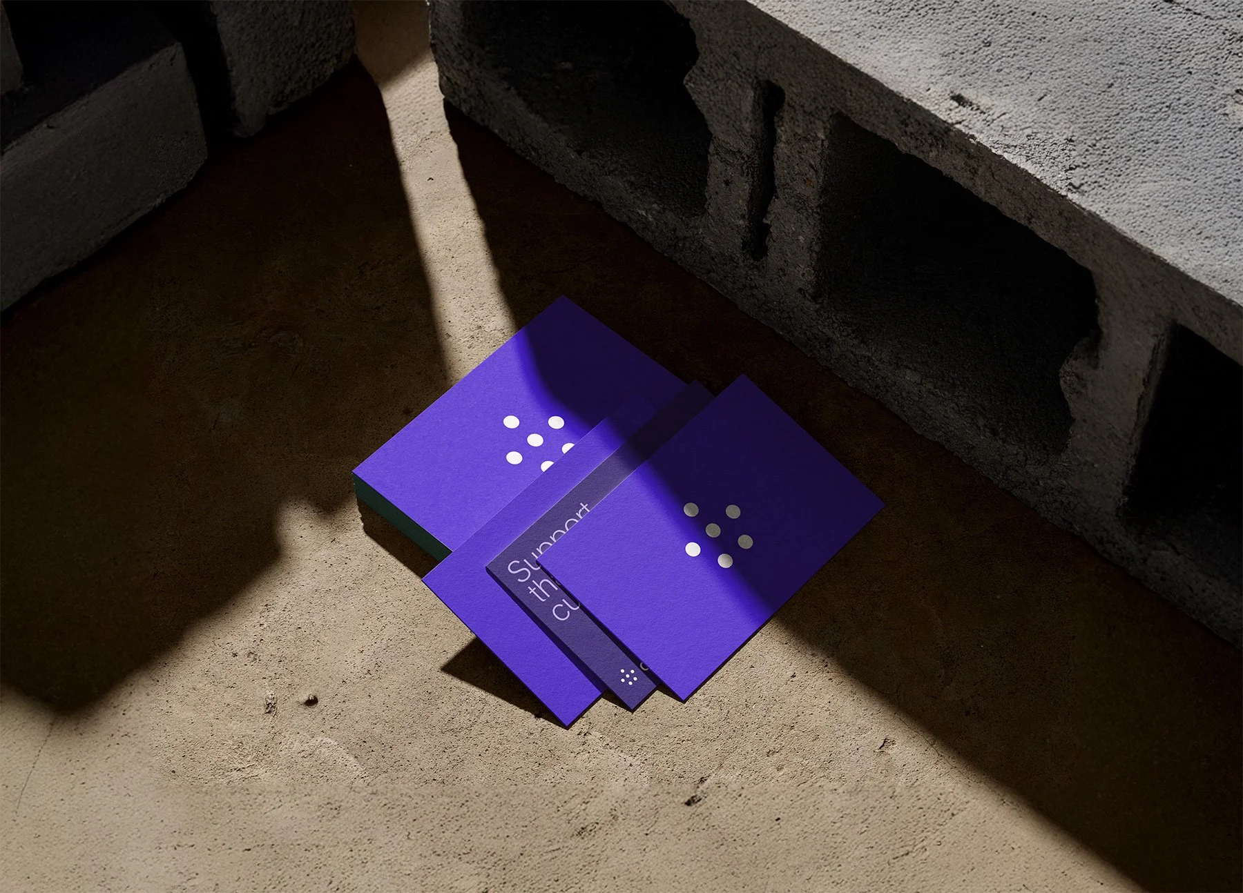 Business_Cards_On_Concrete_Mockup_3_small.jpg