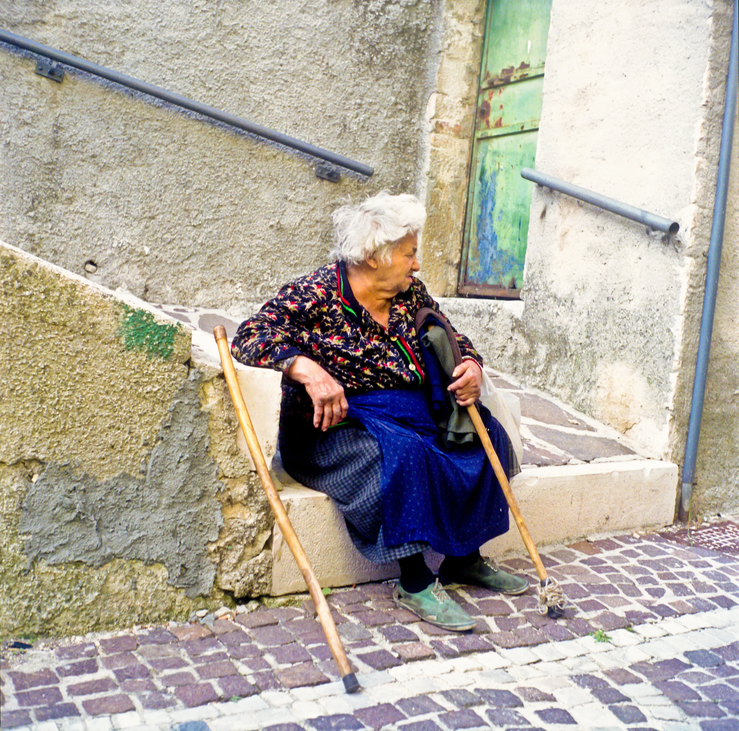 Emma_Sywyj_Woman Sitting in Small Village, Italy.jpg