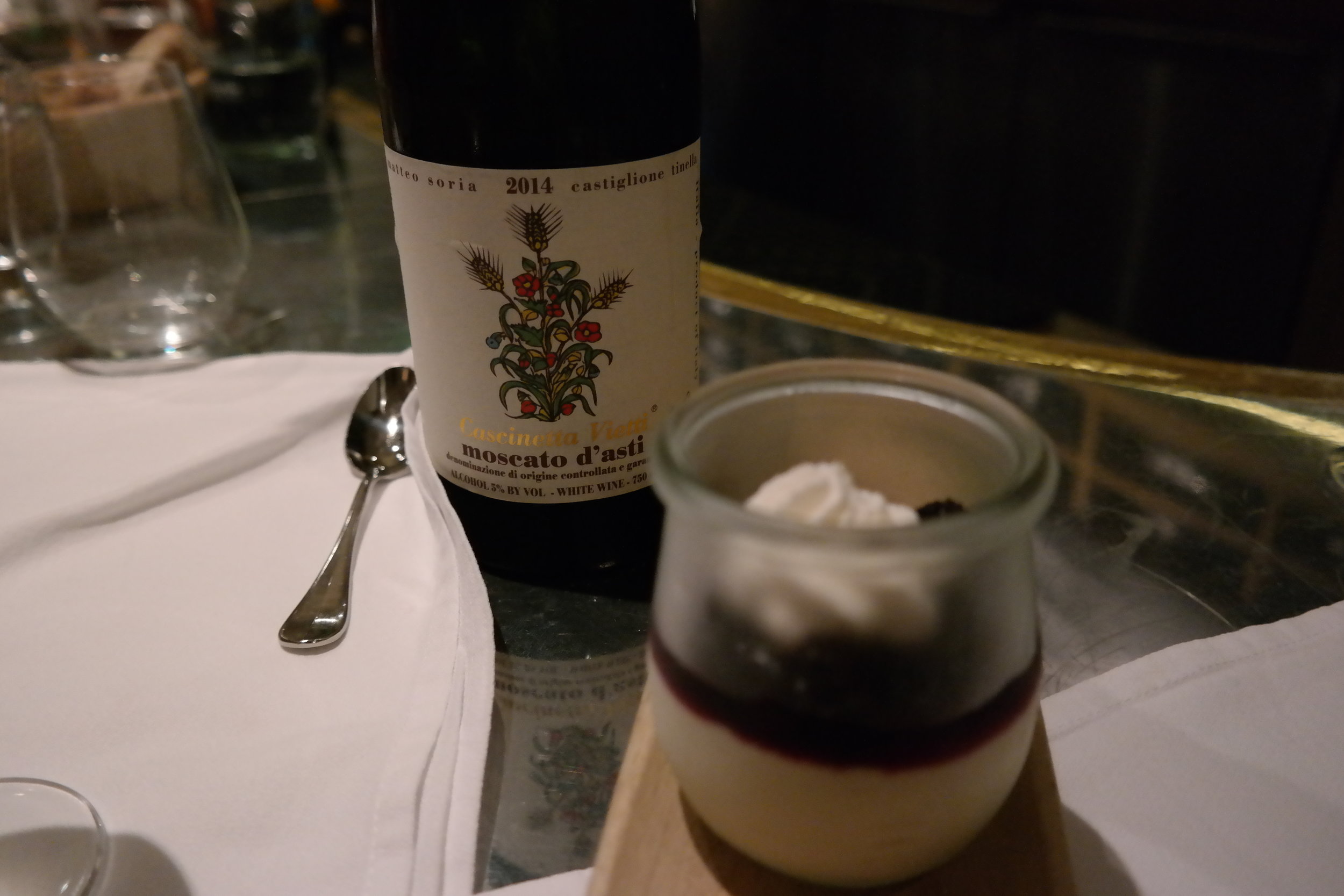 Committed with the Italian dessert wine and rich Potted Cheesecake with whipped chantilly cream and poached blueberry perfection- Ad Hoc Napa 