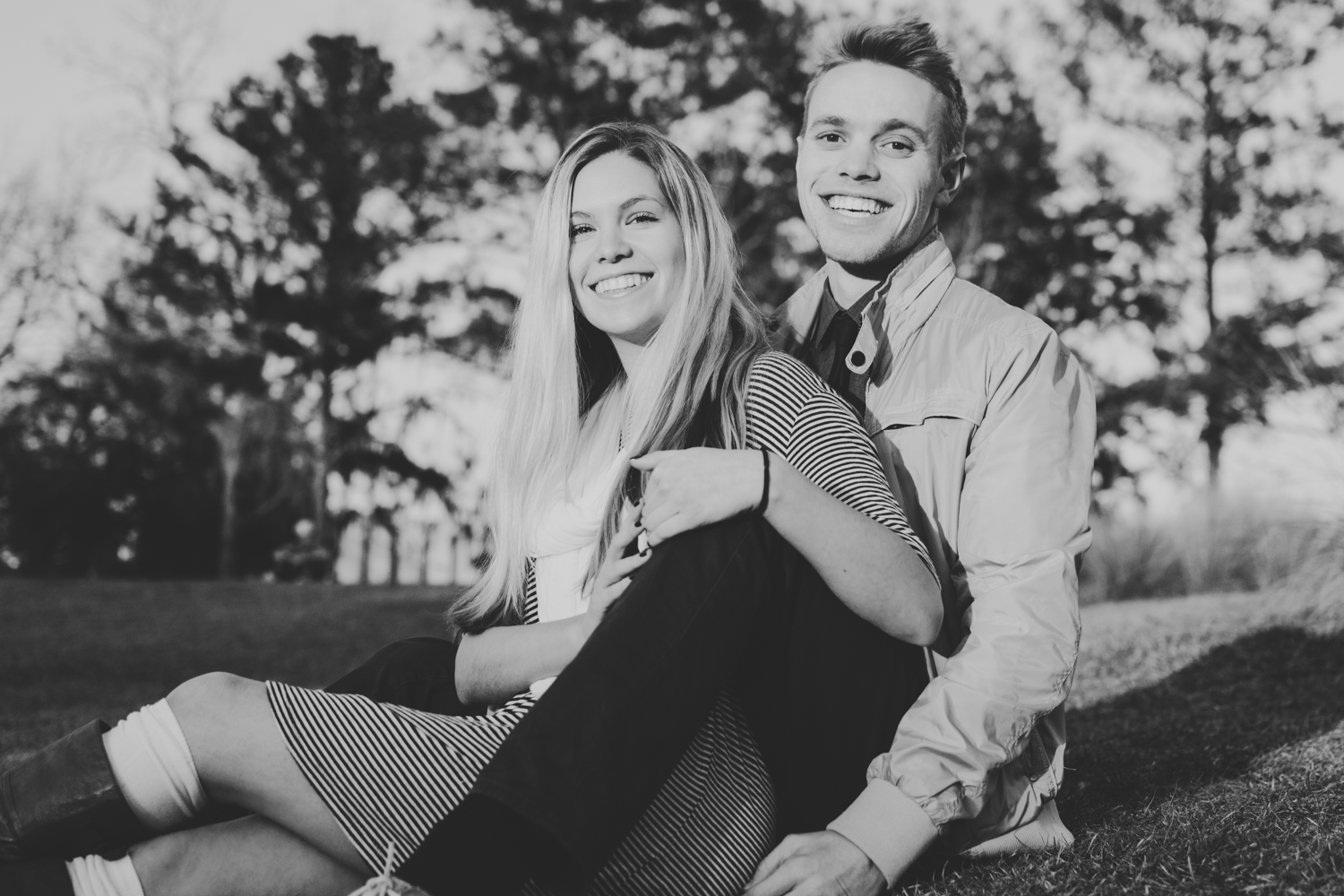 A picture of Jake and Erica sitting in the grass