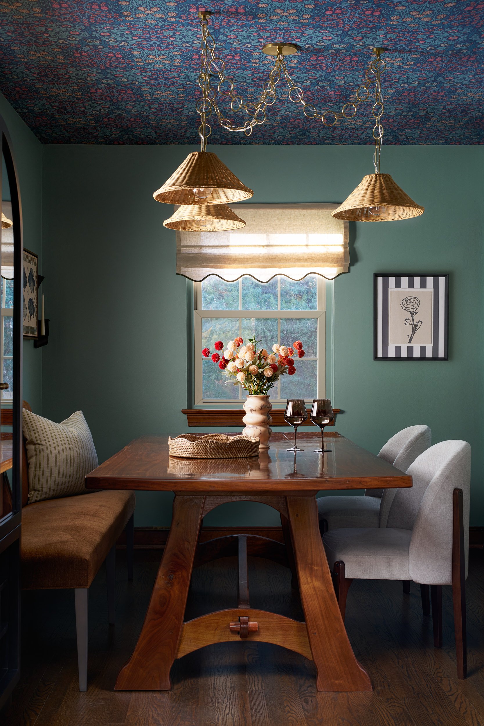 Dining room with teal walls and a patterned ceiling, interior design photography in Washington, DC