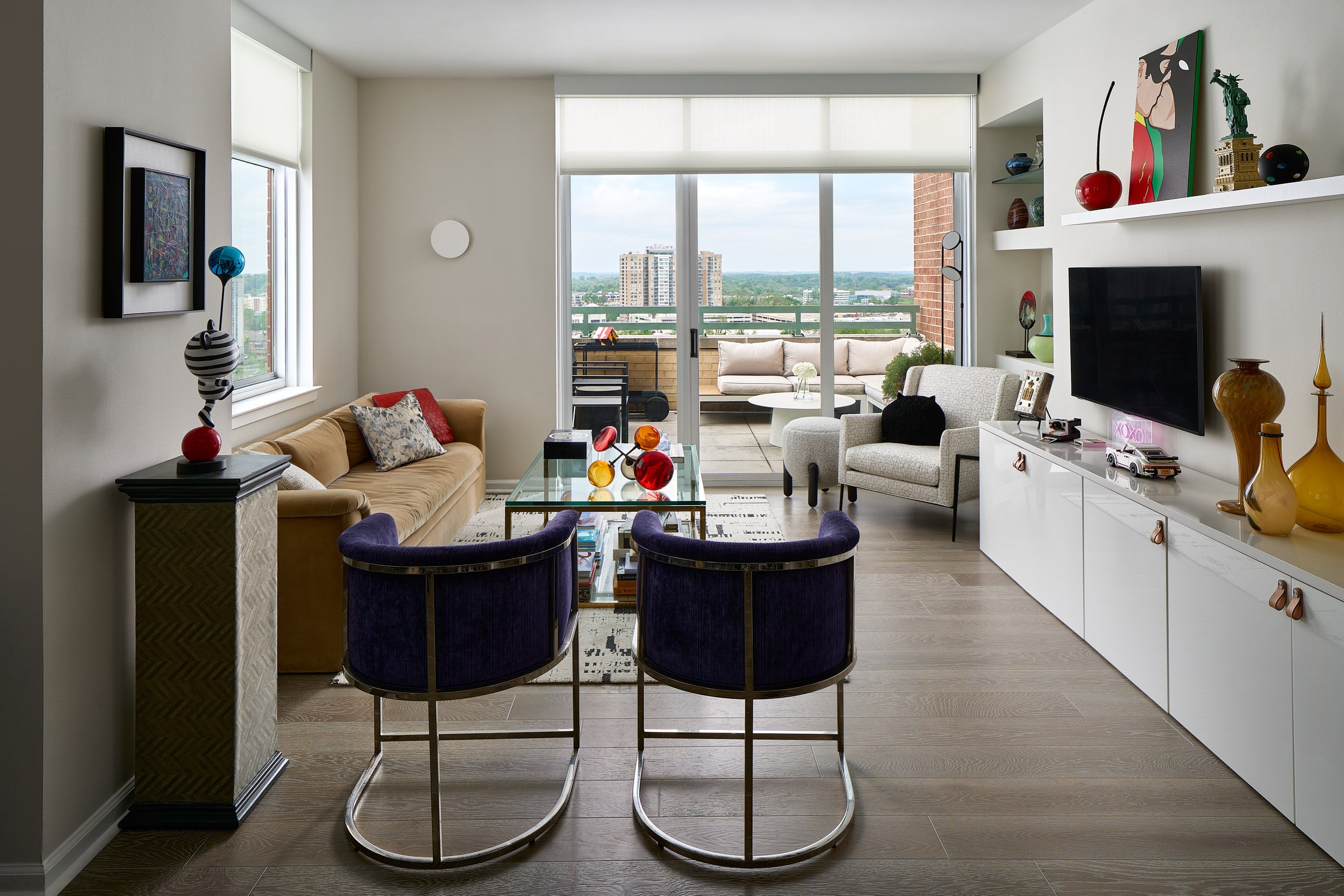 Condo living room with a city skyline view, interior design photography in the DMV area