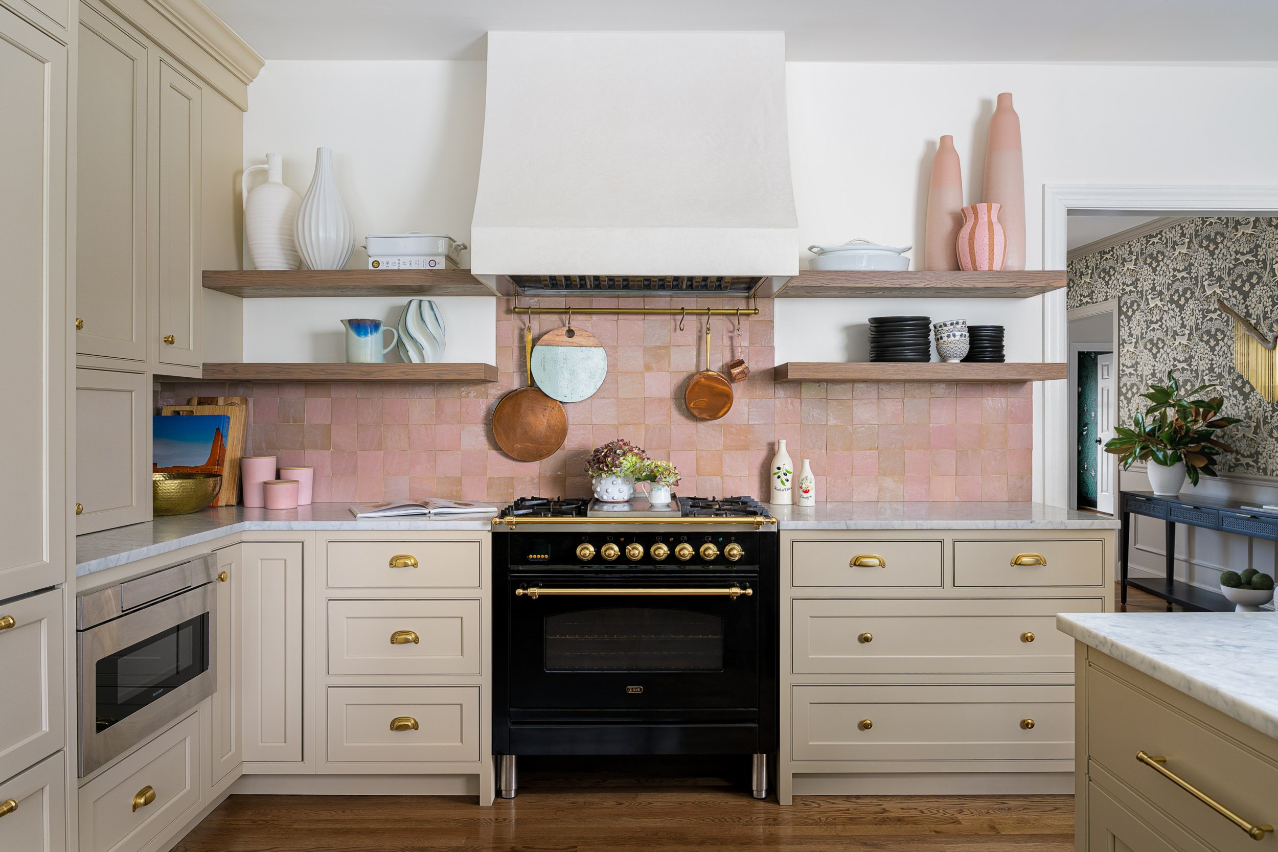 Kitchen with pink zellige tile backsplash and a black range, interior design photography in Northern Virginia