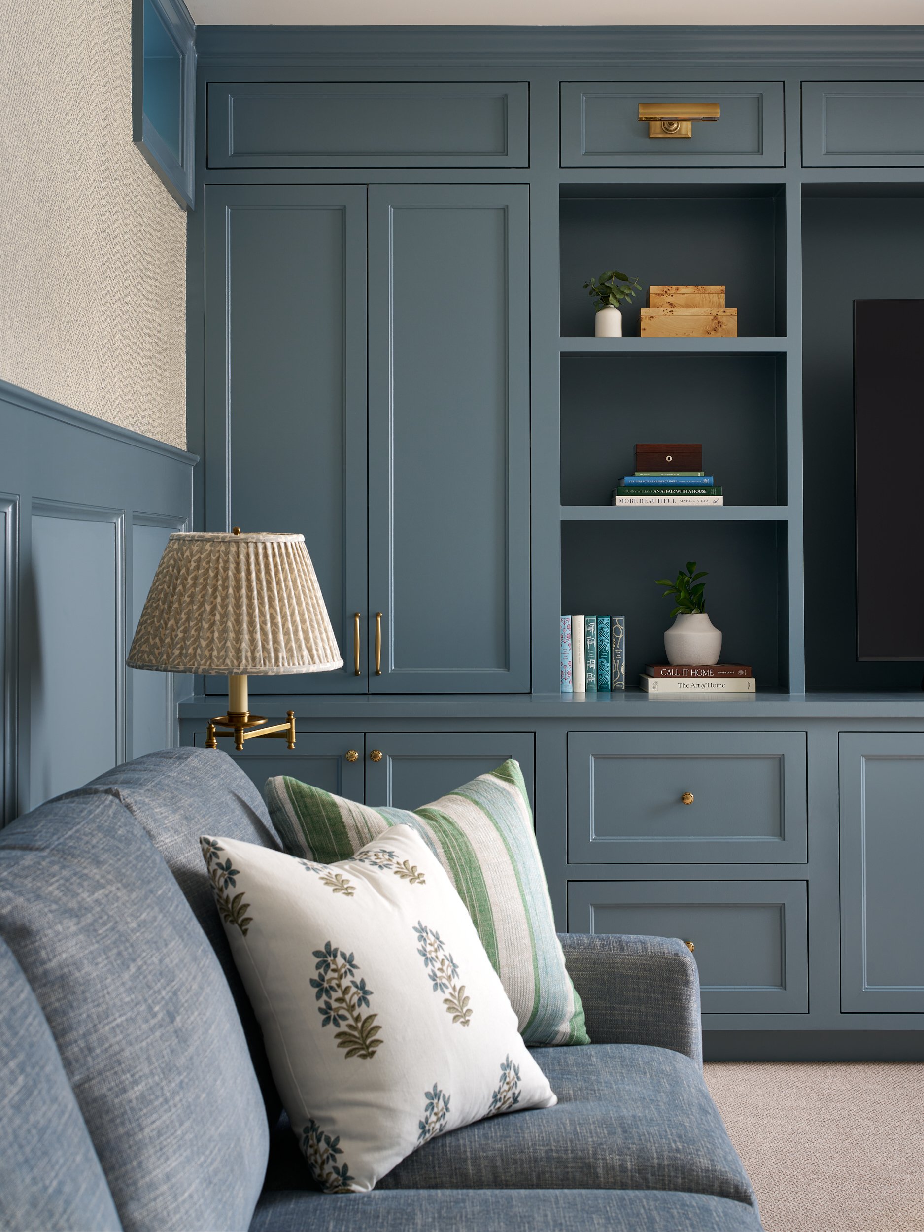 Family room with blue built-in cabinetry, interior design photography in Northern Virginia