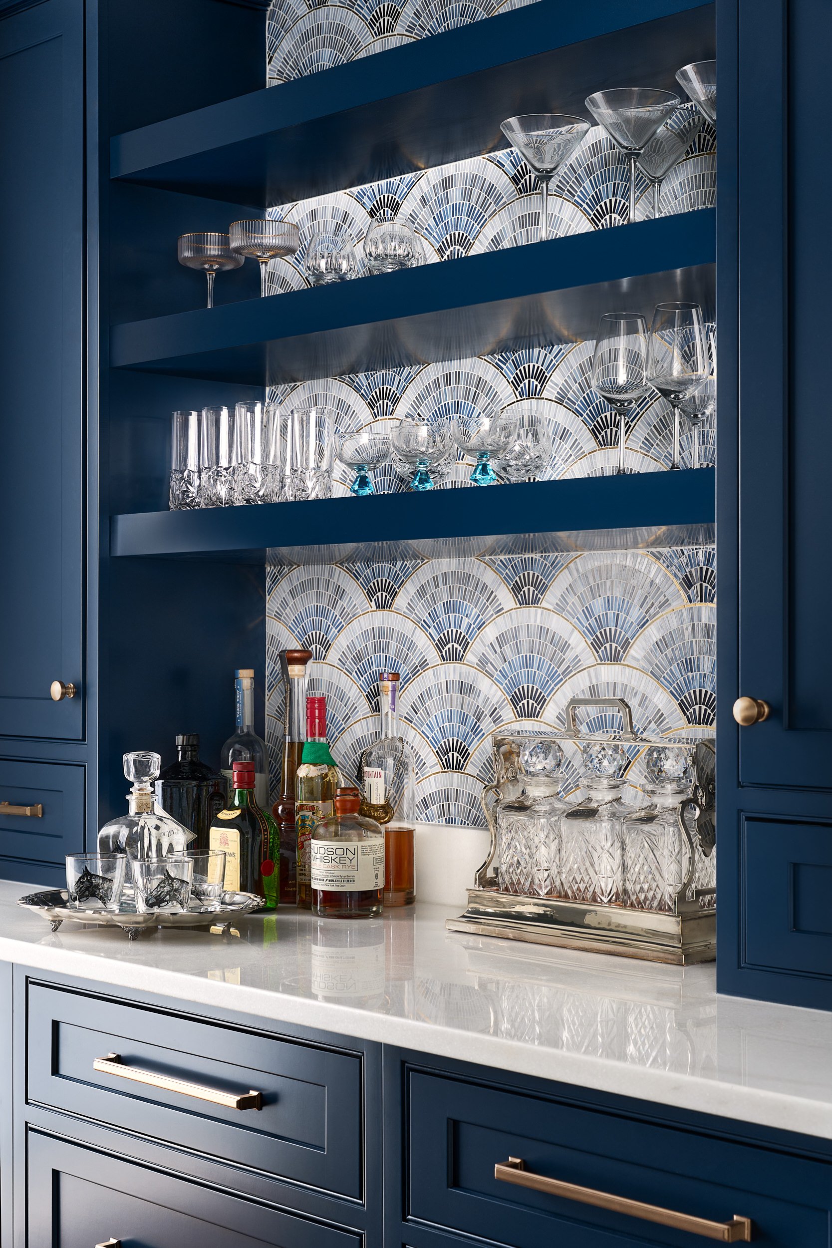 Butler's pantry and wet bar with navy cabinetry and art deco tile, interior design photography in Washington, DC