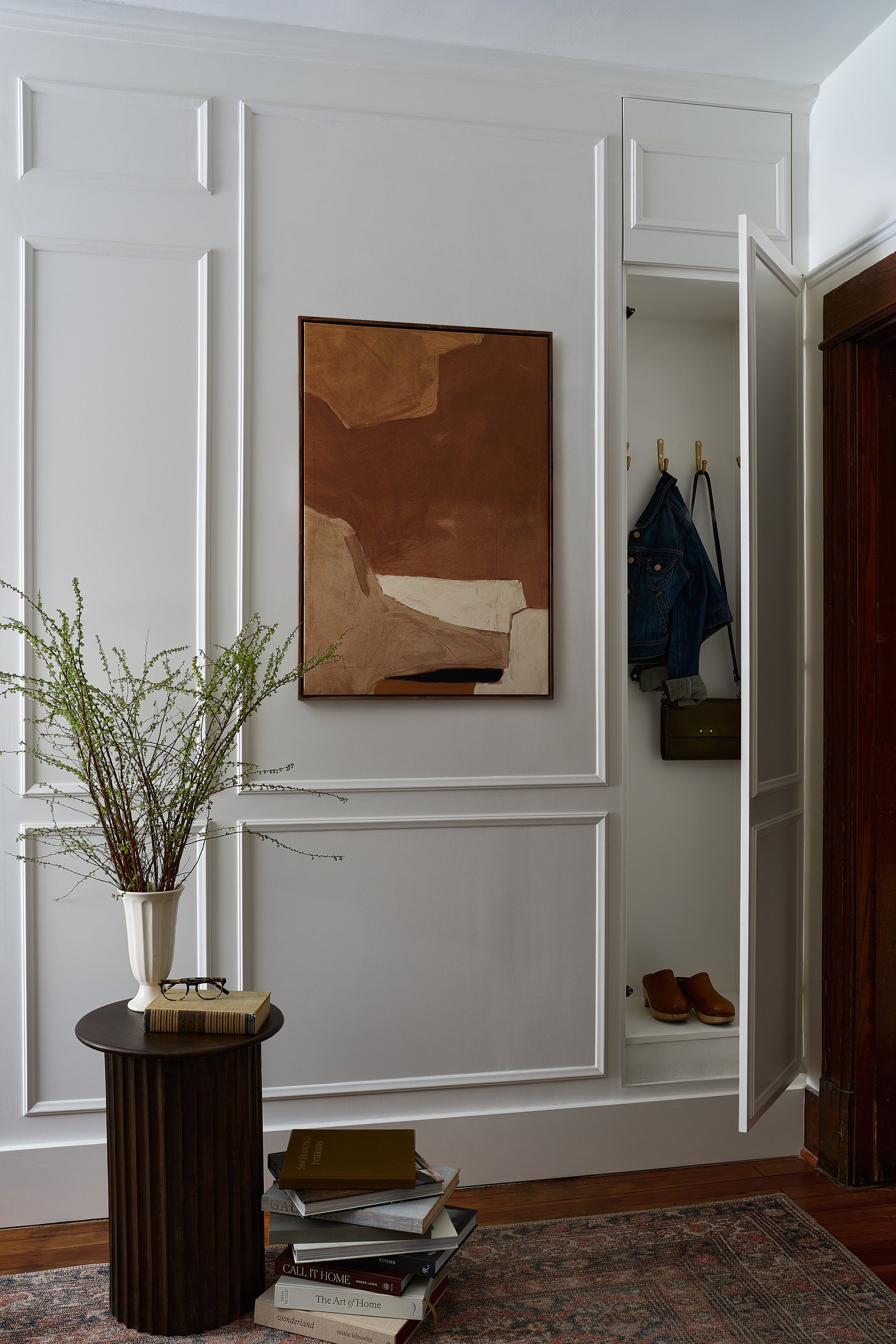 Mudroom closet with abstract art, interior design photography in Washington, DC