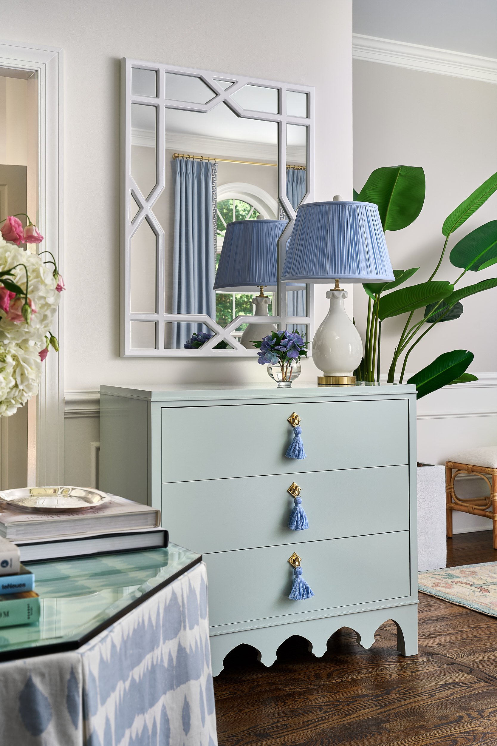 Bedroom vignette with a seafoam green dresser, interior design photography in Northern Virginia