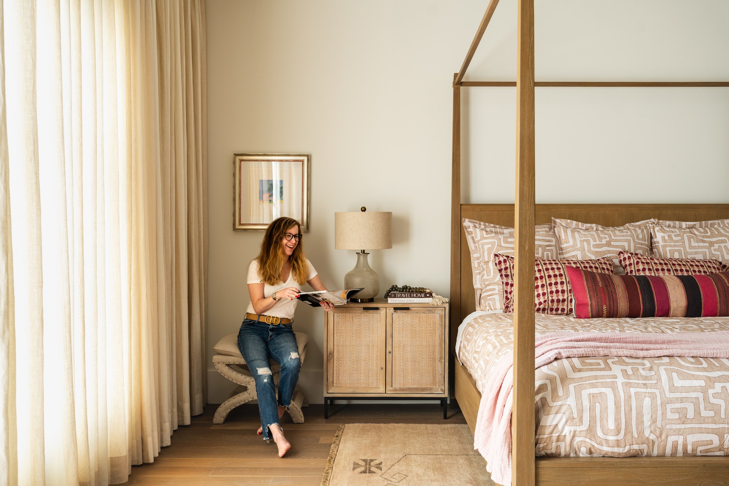 Bedroom lifestyle vignette with a canopy bed, lifestyle interior photography in the DMV area