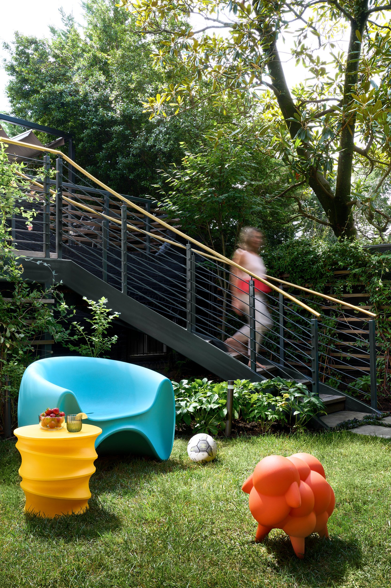 Backyard patio and staircase with outdoor seating, lifestyle interior photography in Maryland