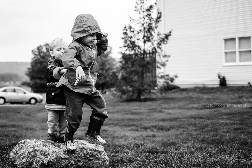 we found this great rock on a walk around our neighborhood. they immediately set to jumping (or pushing each other) off of it. after that it wasn't so great anymore ;)