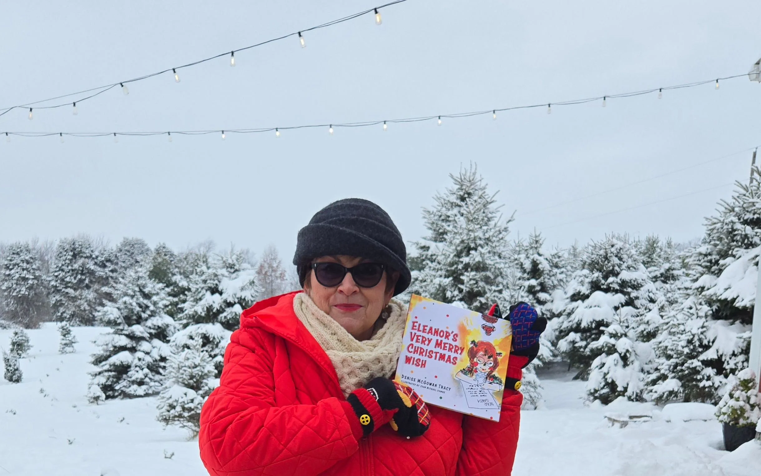 Denise with book at Red Barn .jpg
