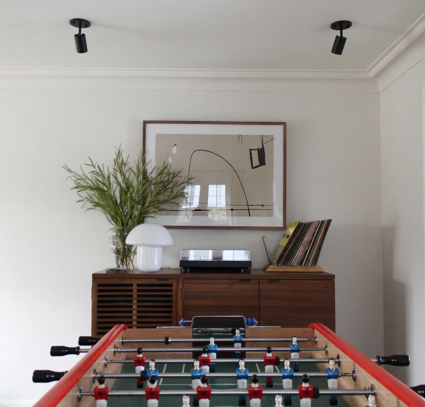 Music on. Game on. Proof that a space can be playful and polished. 

#pittsburghinteriordesign #pittsburghhomes
 #pittsburghinteriordesigner #midcenturydesign