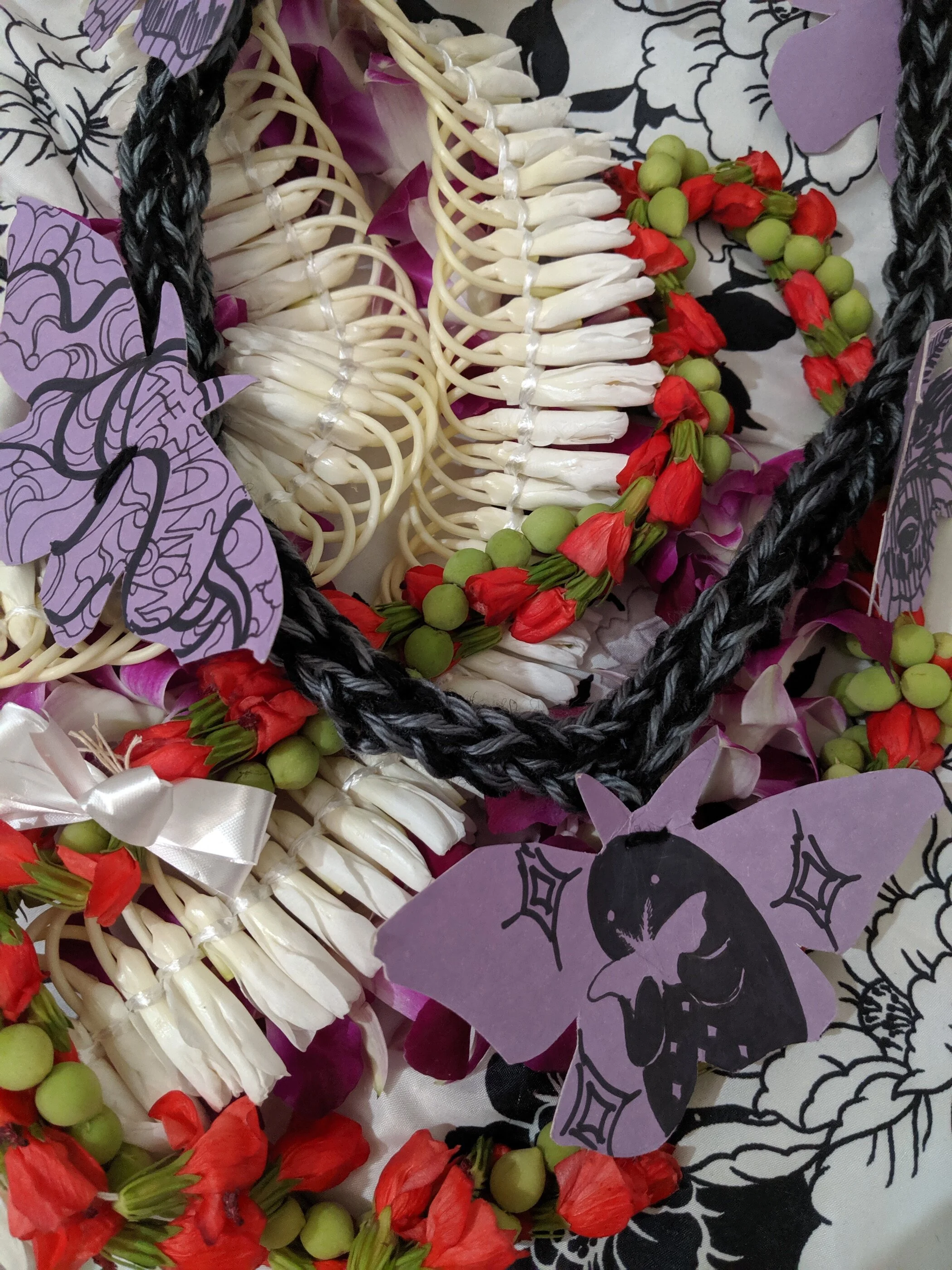 Leis from the opening. Thank you to everyone who came to see the show!