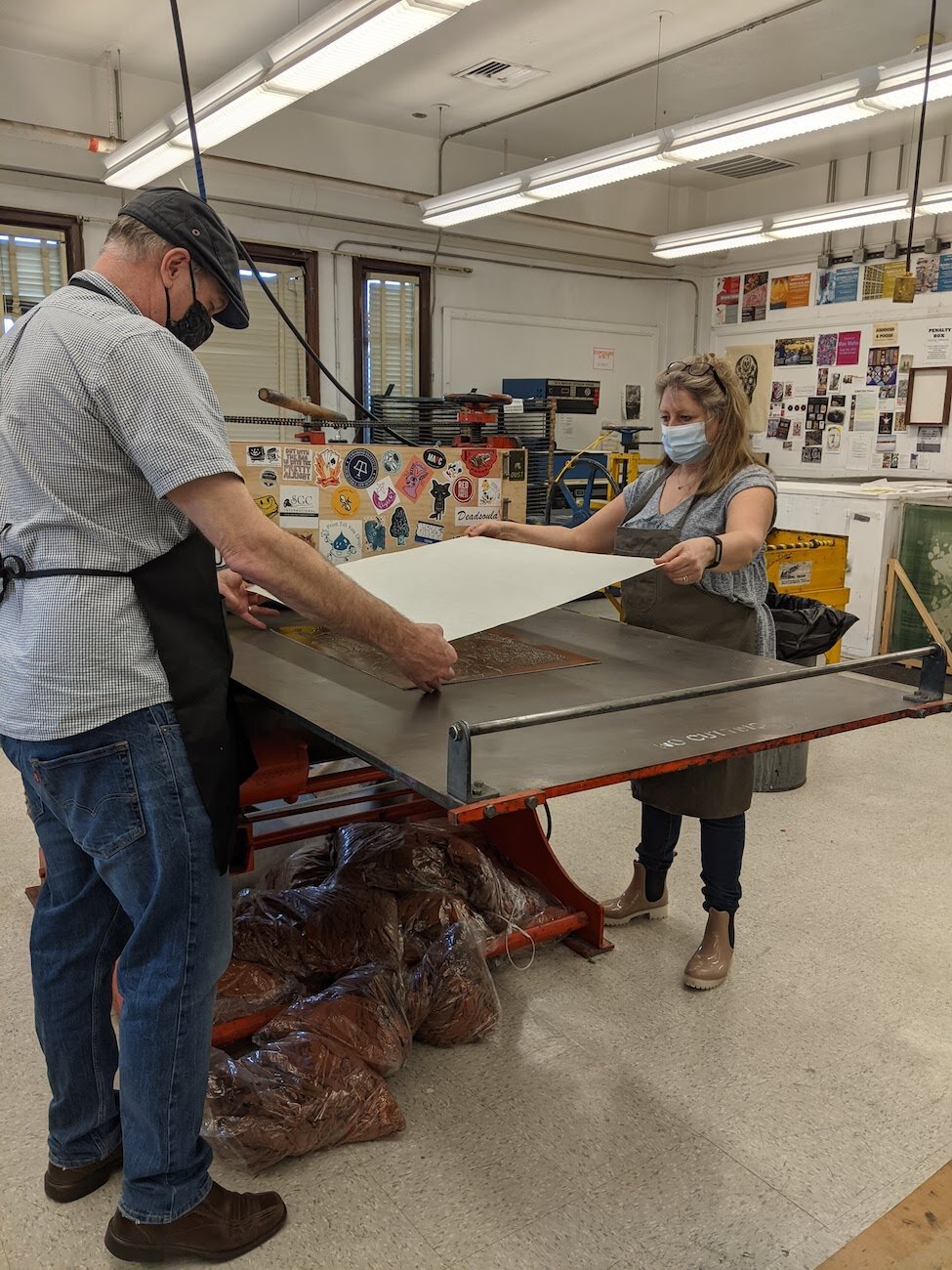  Jim assists Claire with printing. 