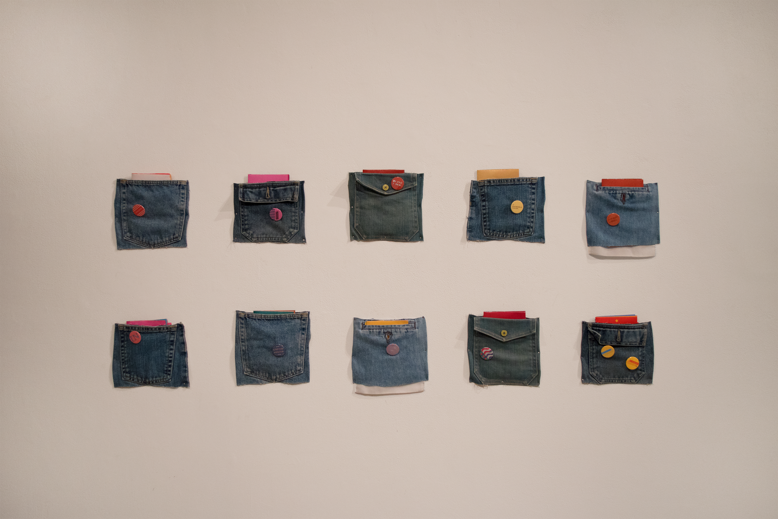  The zines were displayed in denim pockets, a nod to a quintessential United States fashion garment. 