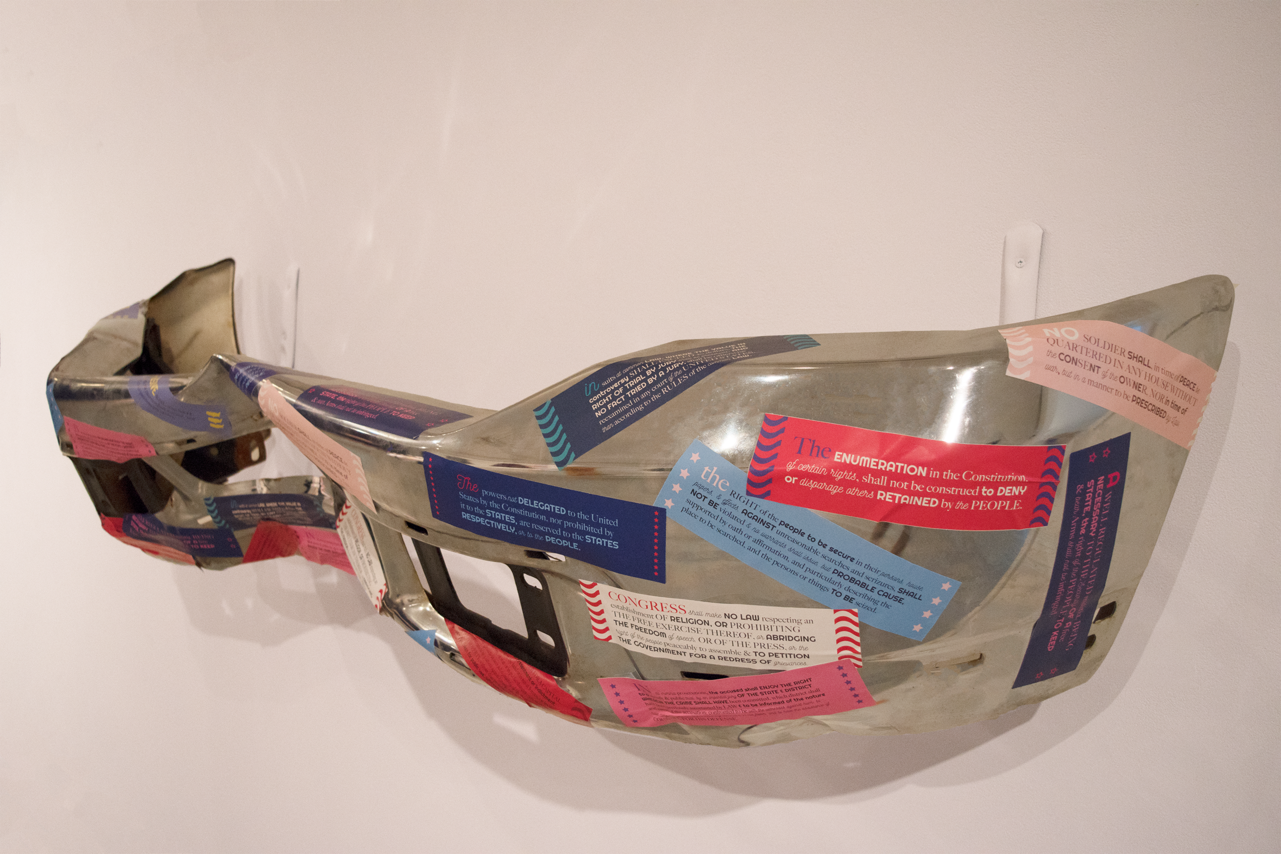  The installation contained stickers that were displayed on a pickup truck bumper and are impractical as actual bumper stickers, much like the language of the Bill of Rights and it’s difficulty to be understood by much of the general population. 