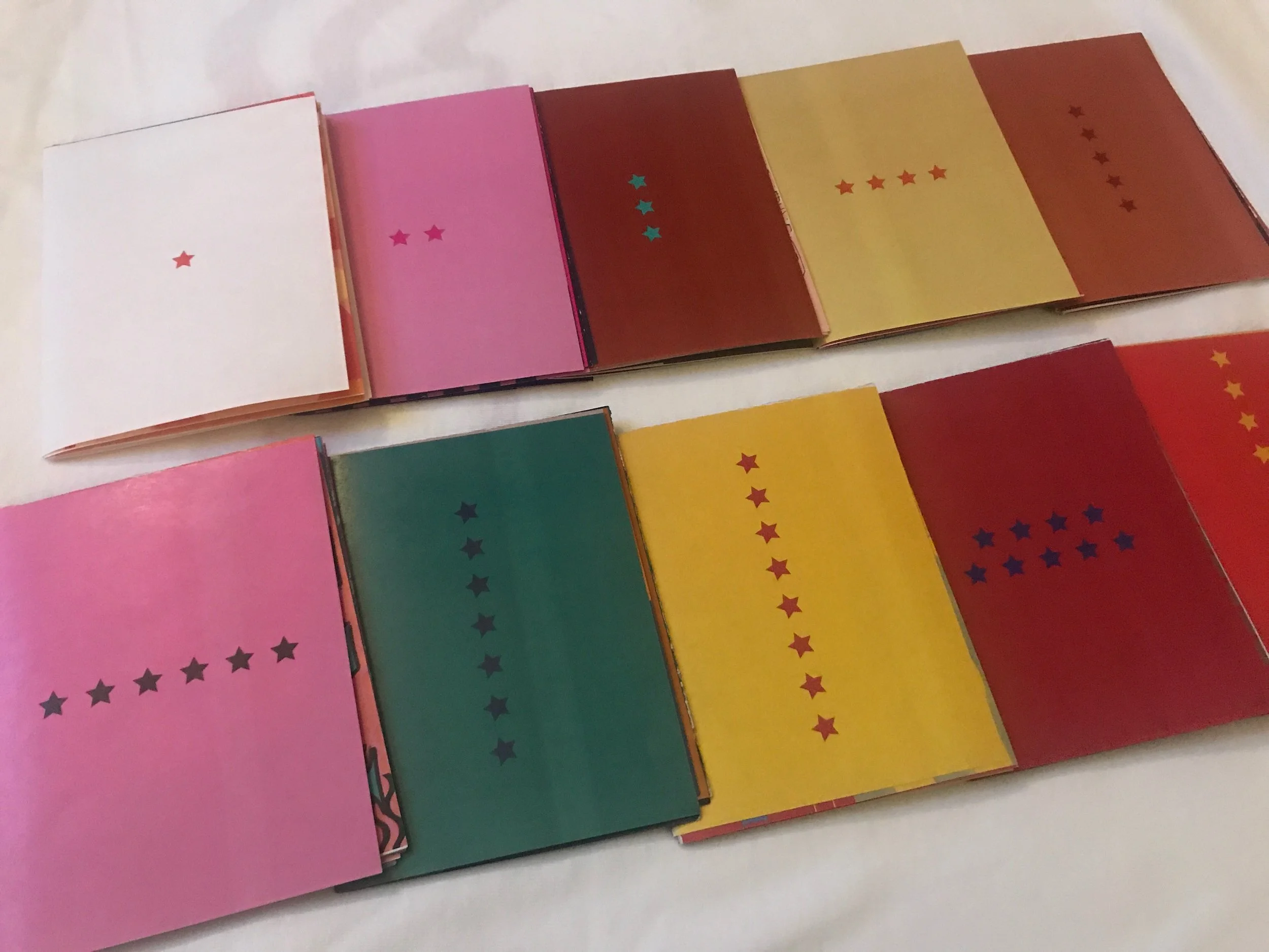 Zine covers, meant to be easily collectible and easily portable and recognizable as a set.