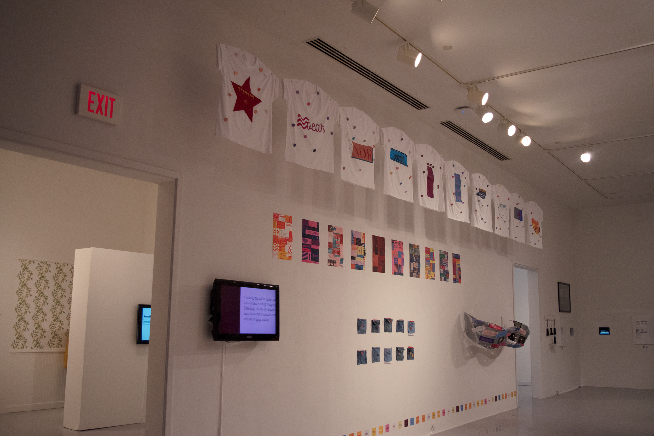 The installation included posters, t-shirts, pins, stickers, zines, and a video.
