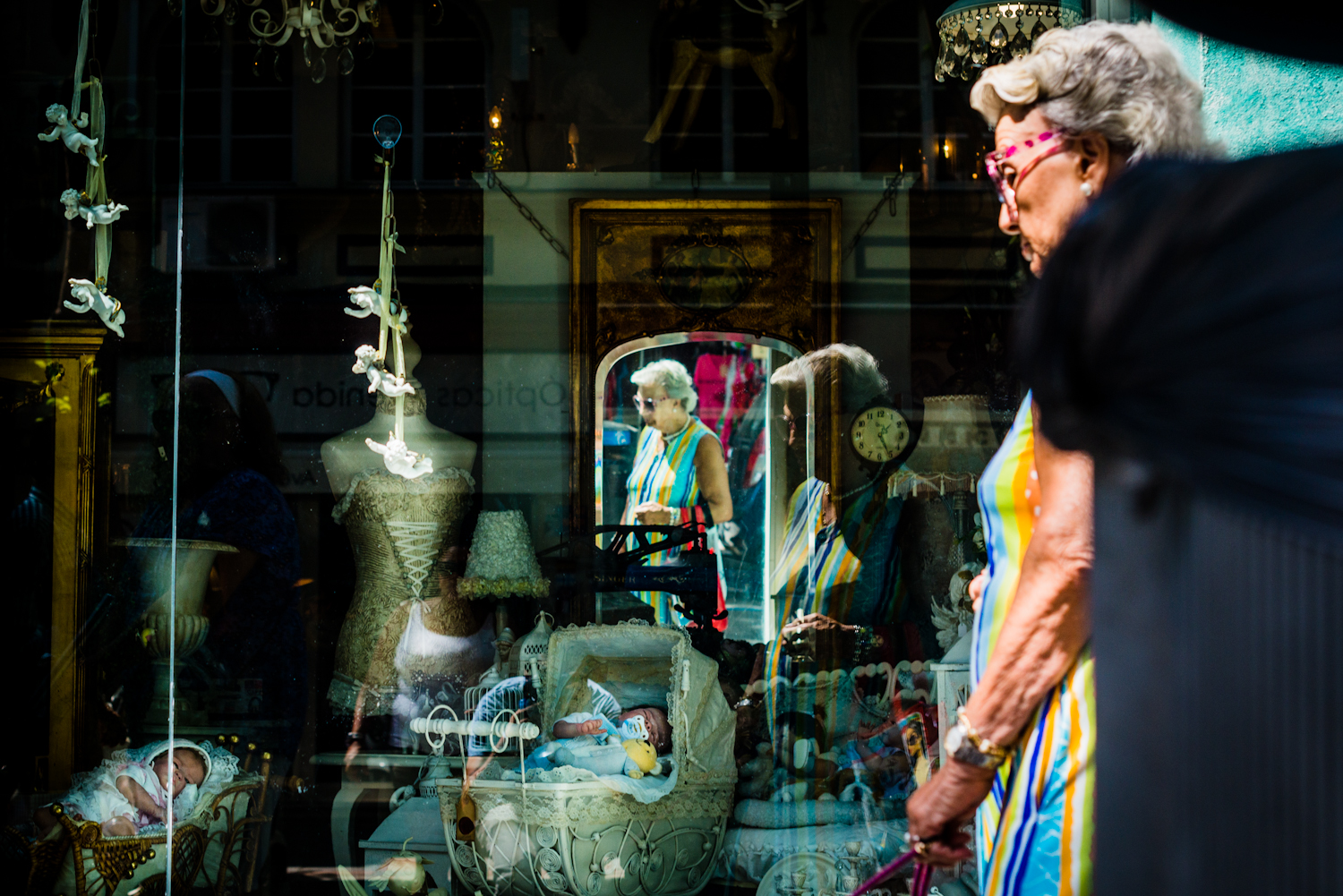 The Lady, her reflections, and Conjunction of Elements in a Window, Spain, 2016