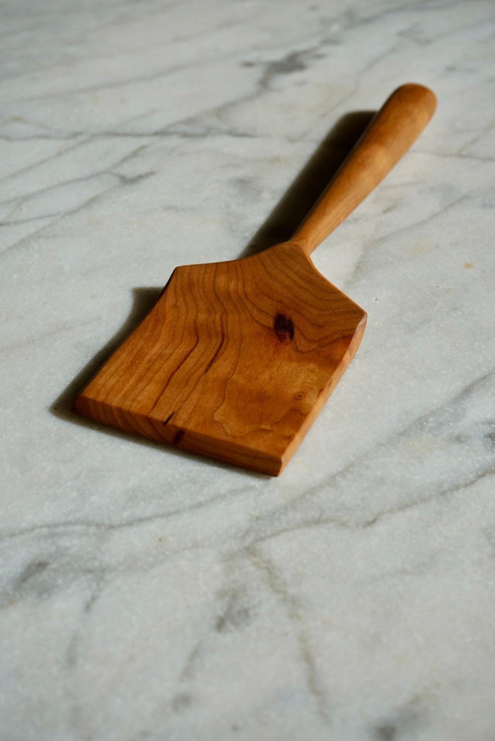 Large cherry wood flipper spatula.